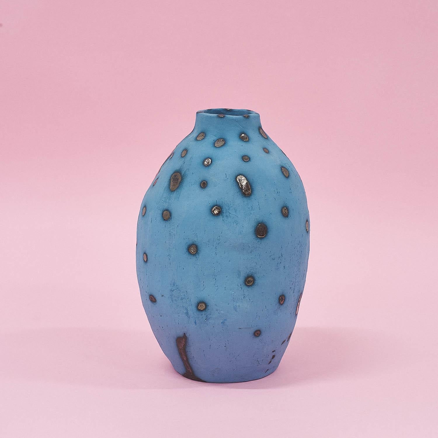 Papaya vase by Siup Studio
Dimensions: D13 x H21cm
Materials: Ceramics

Siup is a small design studio based in Warsaw. The concept is created by three friends – Martyna Dymek, Marcin Sieczka and Kasia Skoczylas – who have met in University of