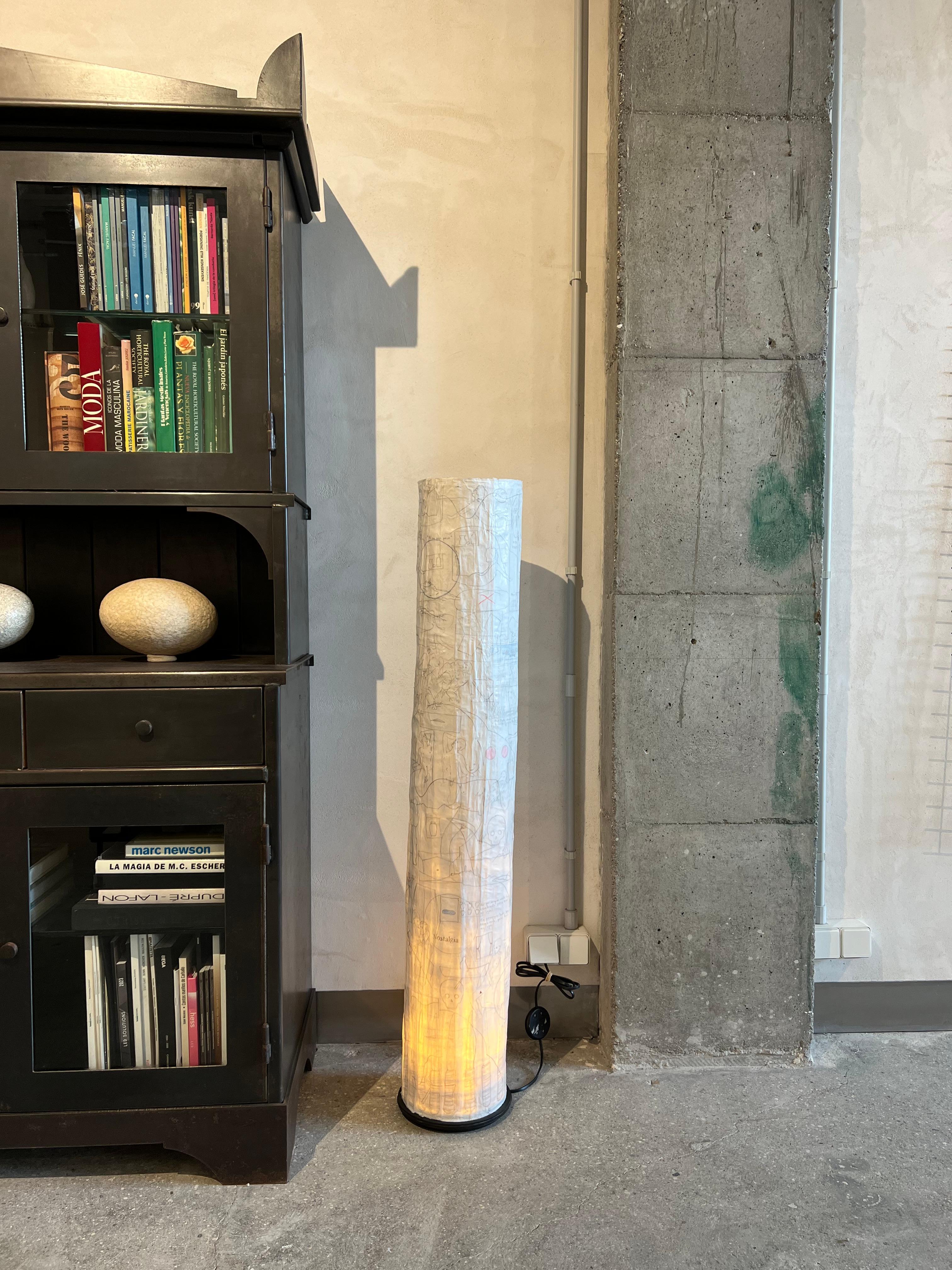 Lamp made from artist Peter Kramer's sketchbook and turned into a special floor lamp. The majesty of the original drawings incorporated into the lampshade make it a unique and unrepeatable piece. It can be wired for the US and European electrical