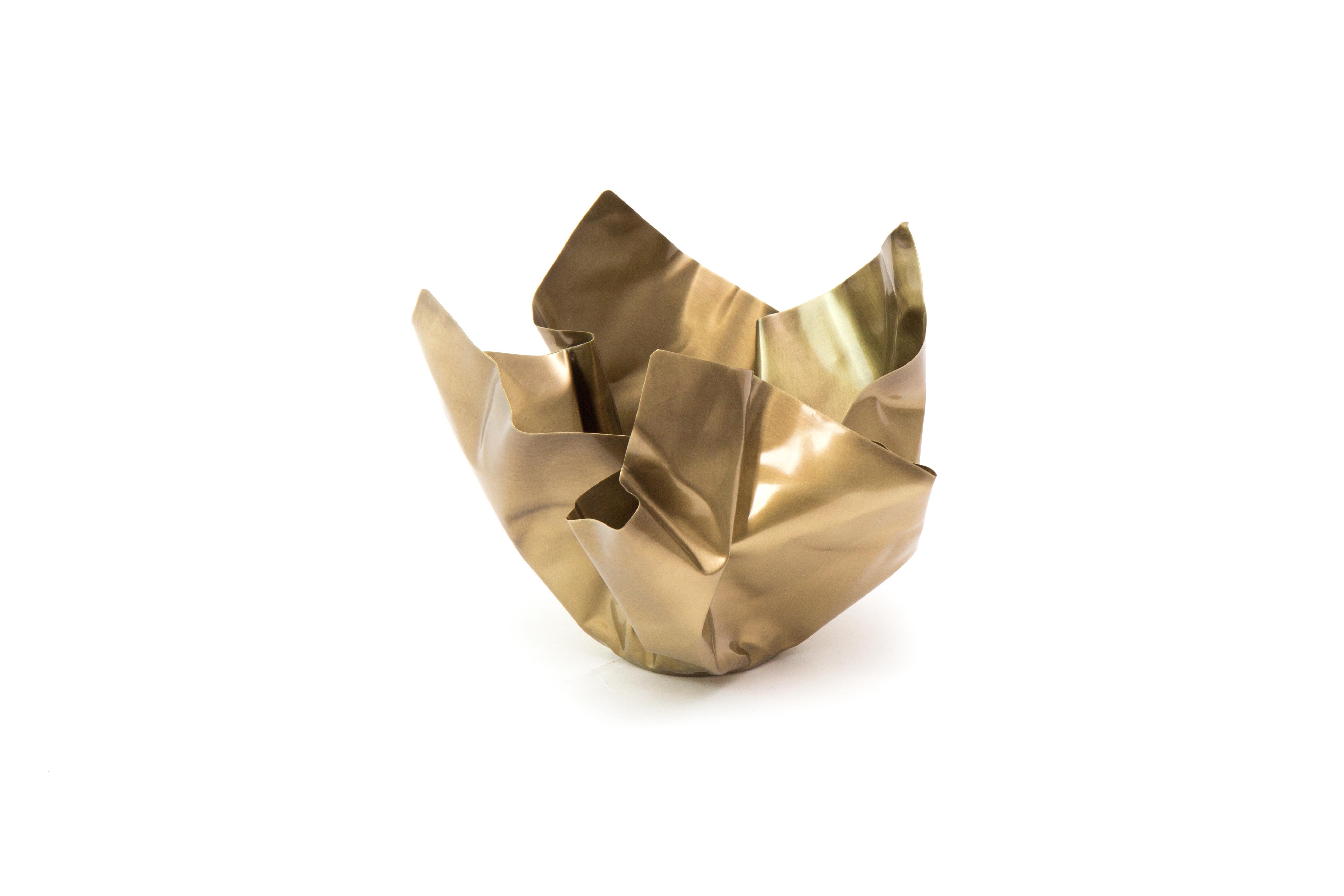 Paper brass bowl II by Gentner Design
Dimensions: D 17.7 x W 22.8 x H 14 cm
Materials: tarnished brass
Available in tarnished brass and darkened brass.

The Paper Series embodies the idea of crumpling paper set in time. The materiality of the