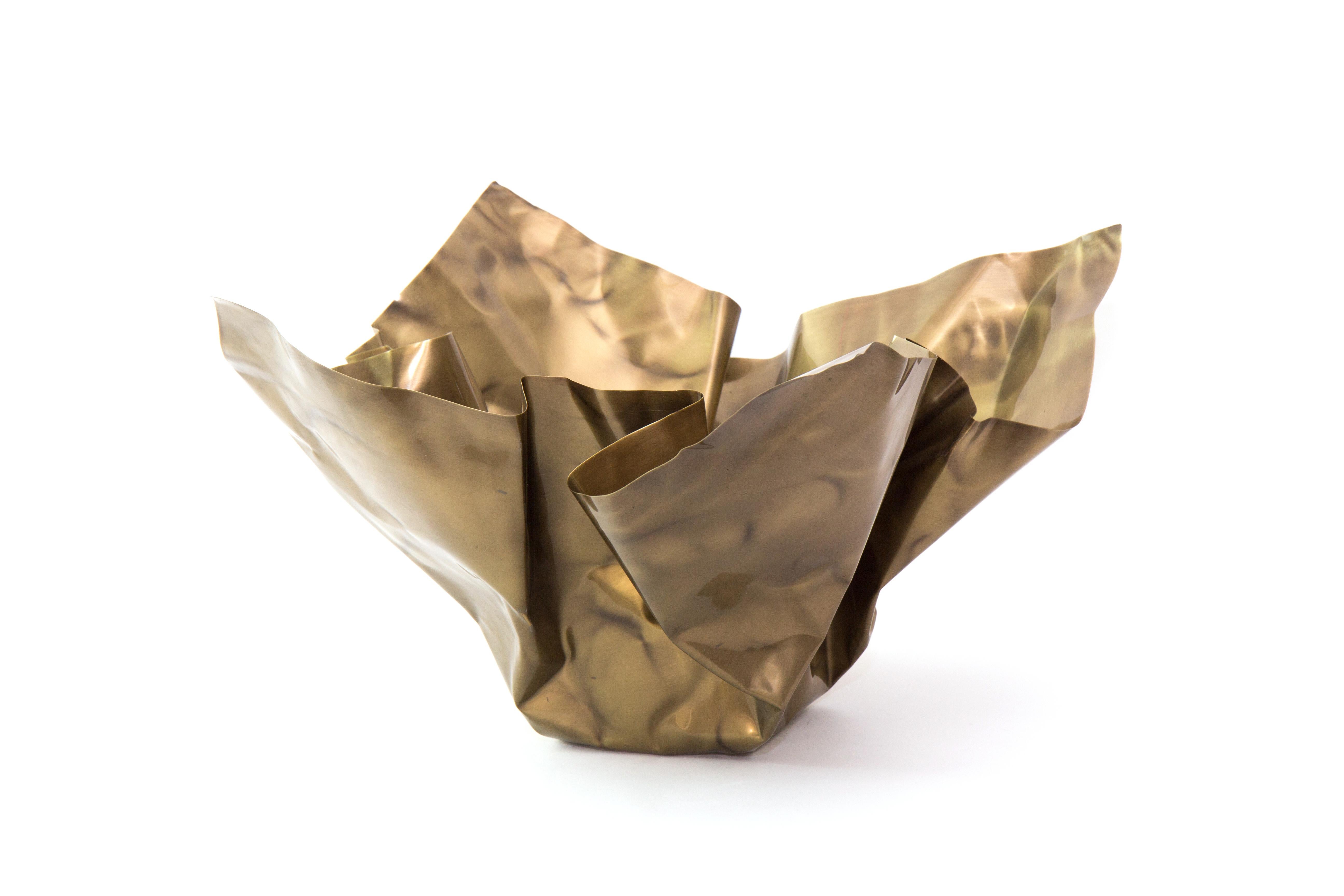 Paper brass bowl III by Gentner Design
Dimensions: D 50 x W 50 x H 25.5 cm
Materials: tarnished brass
Available in tarnished brass and darkened brass.

The Paper Series embodies the idea of crumpling paper set in time. The materiality of the