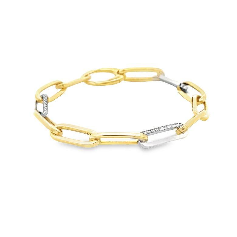 We are thrilled to introduce our latest addition to our fine jewelry collection - an elegant and stylish link bracelet made from 14K white and yellow gold. This modern design is sure to make heads turn with its exquisite view of small diamonds set