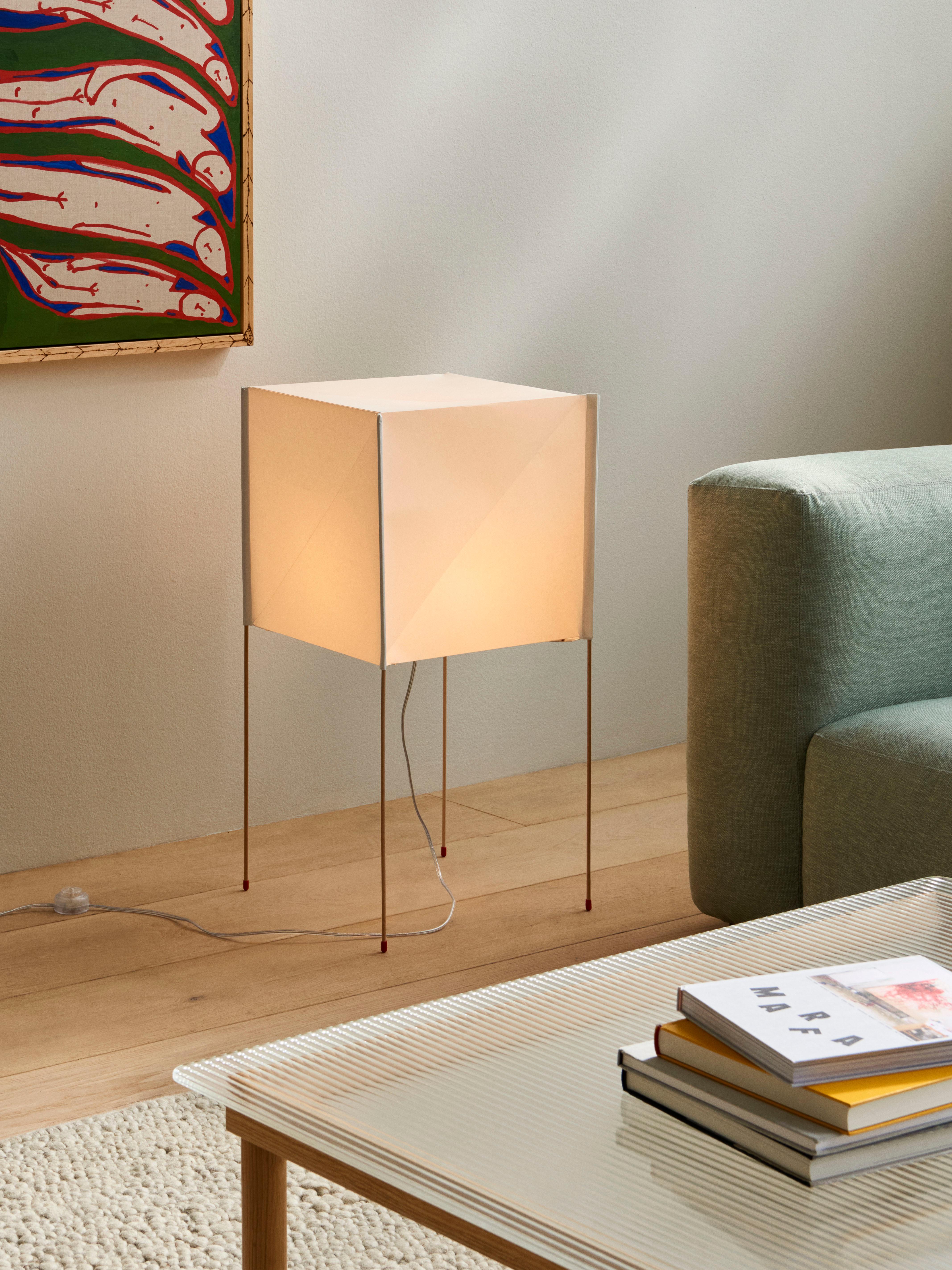 
Designed by Bertjan Pot, Paper Cube is a series of elegant and functional cubed lamps. Inspired by the mechanics of constructing folded paper ornaments, Paper Cube has a flat-pack design that is easy to assemble. Constructed from a strong Japanese