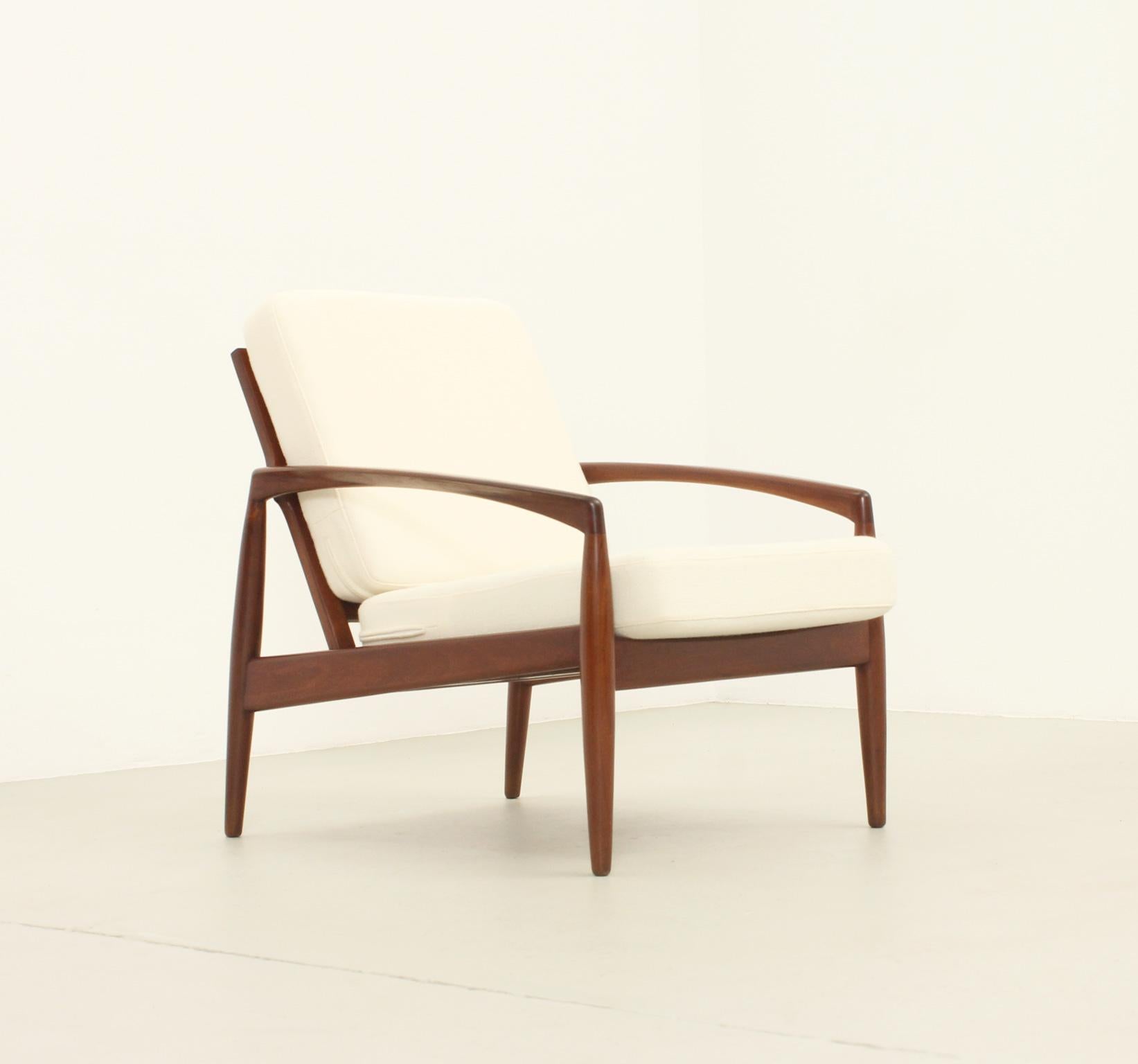 Paper Knife armchair designed in 1956 by Kai Kristiansen for Magnus Olesen, Denmark. Teak frame upholstered with new wool fabric from Kvadrat.