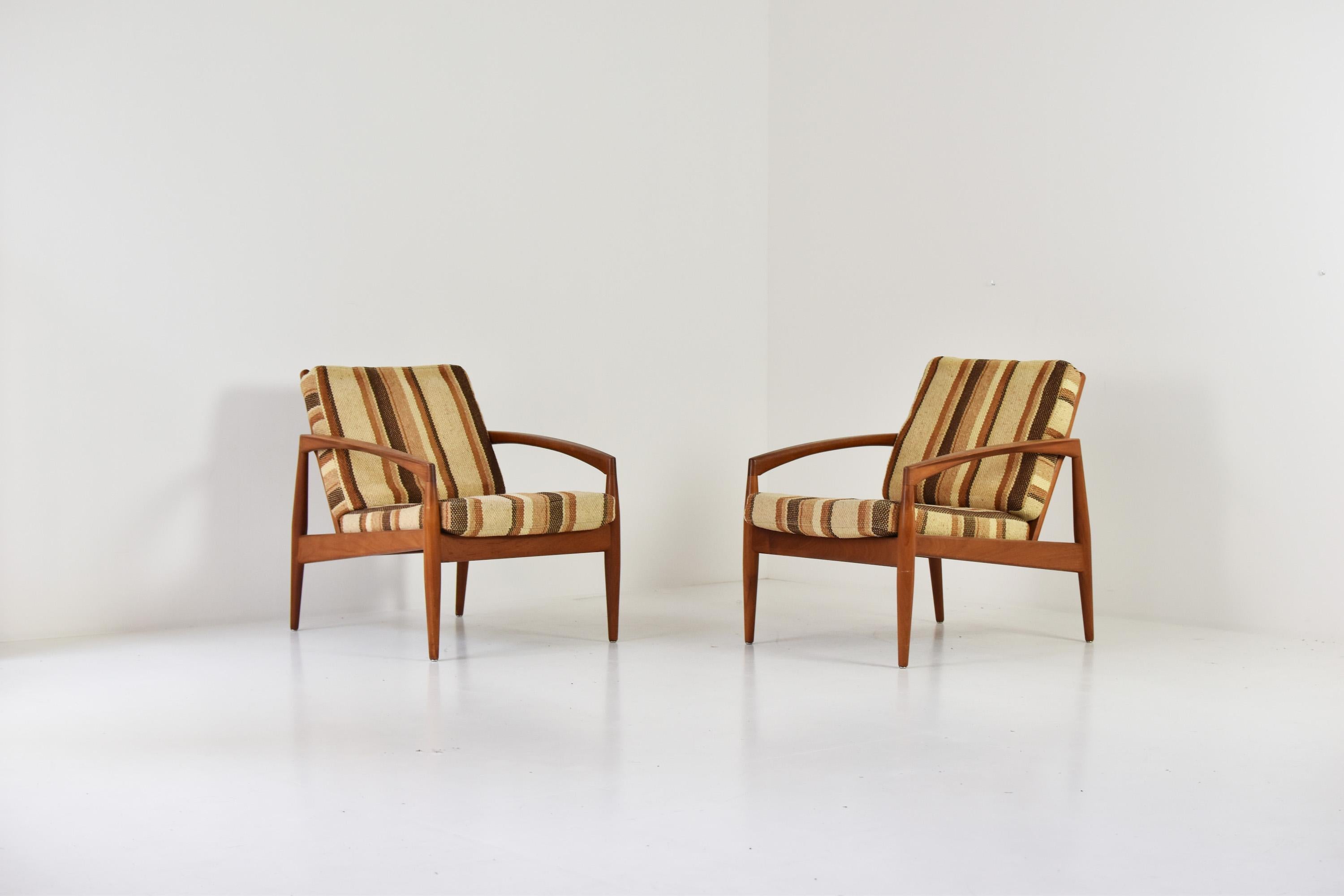 Set of two ‘Paper Knife’ lounge chairs designed by Kai Kristiansen for Magnus Olesen, Denmark 1955. This is model No 121 in teak and has the original wool fabric upholstery. Great condition. Labeled.