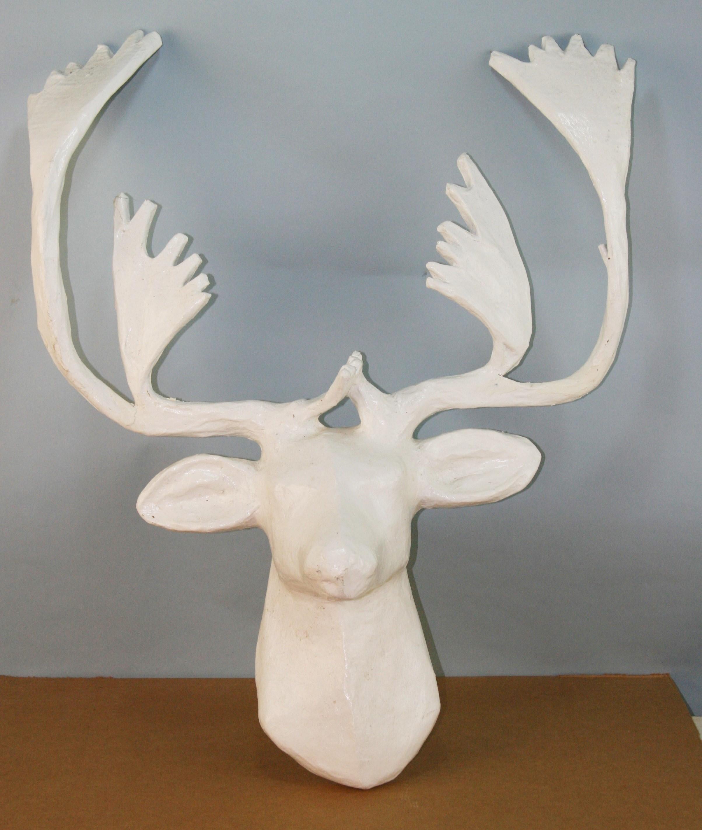 Artist made paper mache deer sculpture.
