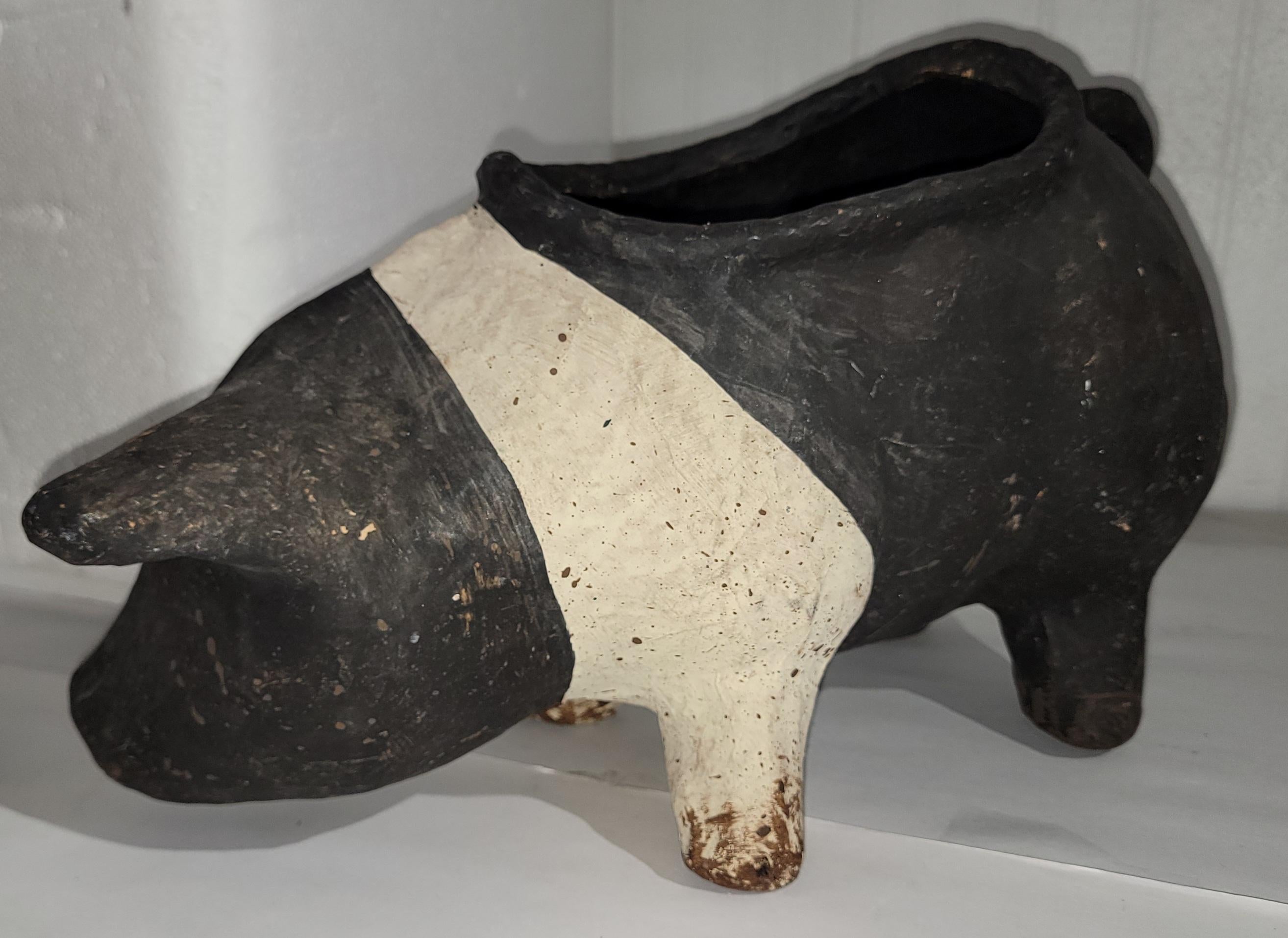 This folky hand crafted & painted in black & white paint in a papier mache material is in very good as found condition.