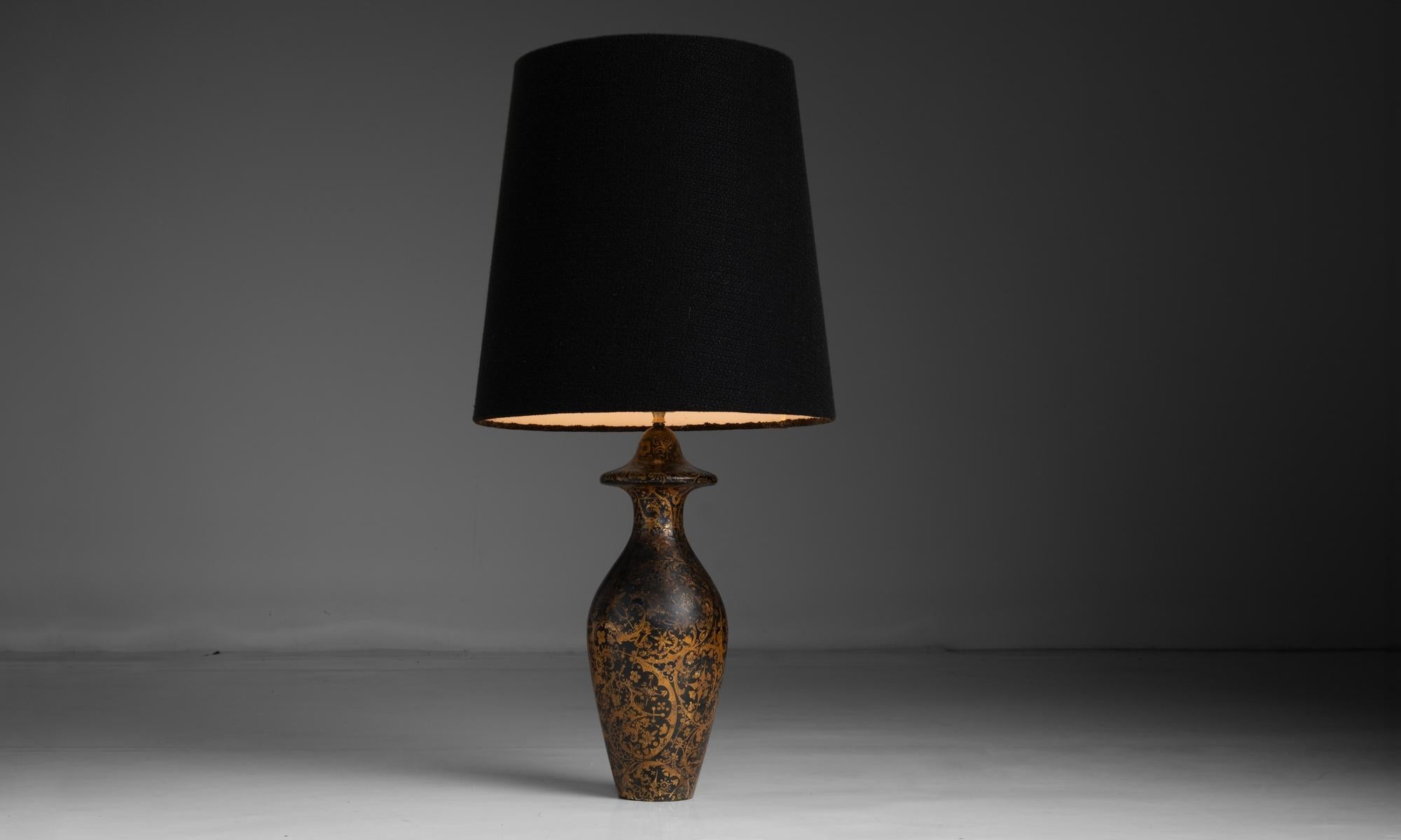 England circa 1890
Paper-mache table lamp that doubles as a vase, with original gilt decorating.
18