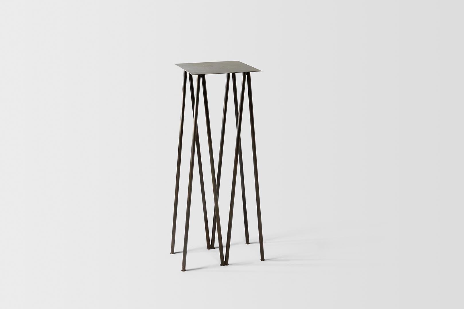 Where metal implies sturdiness and calls for strong industrial motifs - the I/ the H, the beam / the cross, the Paper Table is a play on our own sense of balance. 

It questions the thinness of both surface and structure, in order to reach their