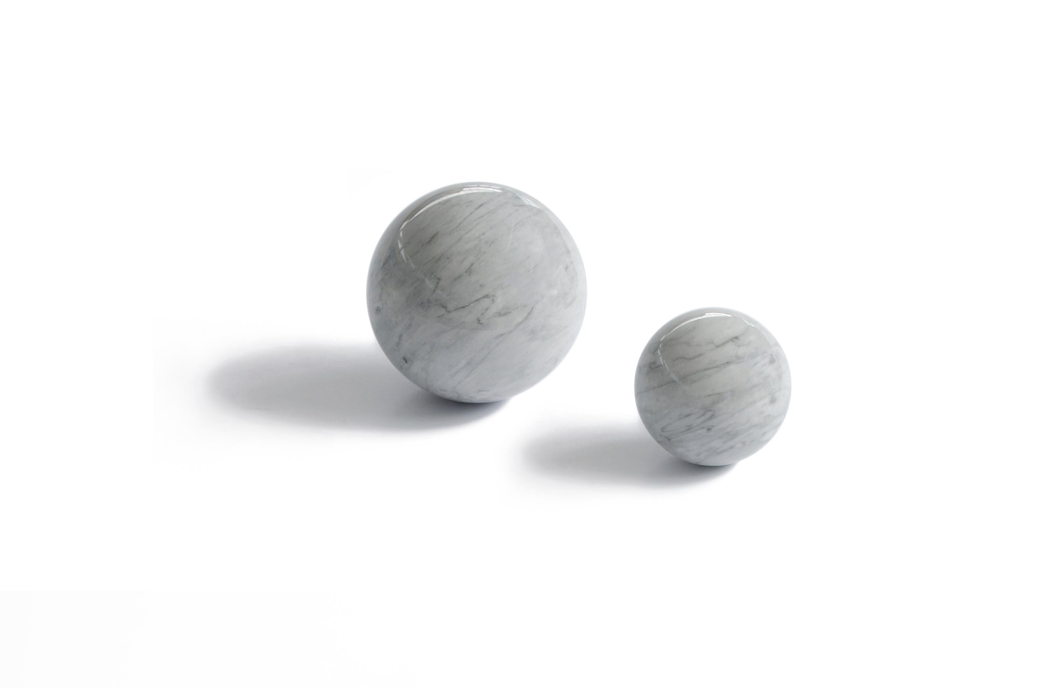 Paperweight with sphere shape in grey Bardiglio marble. Measure: diameter 12cm

Each piece is in a way unique (since each marble block is different in veins and shades) and handcrafted in Italy. Slight variations in shape, color and size are to be