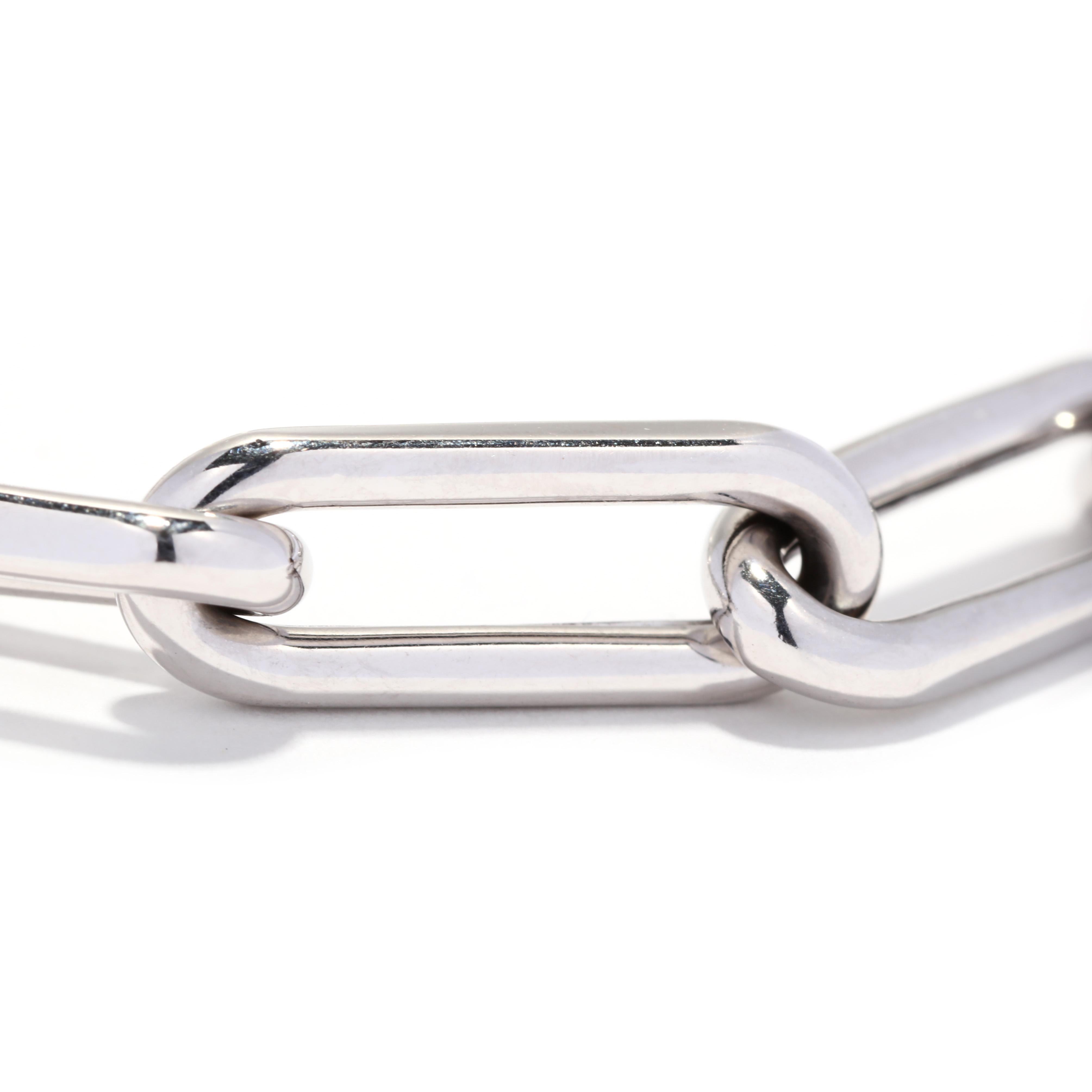 A 14 karat white gold large paperclip chain bracelet. This bracelet features oblong oval ova links with a large lobster claw clasp.

Length: 7.5 in.

Width: 1/4 in.

Weight: 3.9 dwts.



Ring Sizings & Modifications:
* We are happy to assist in any