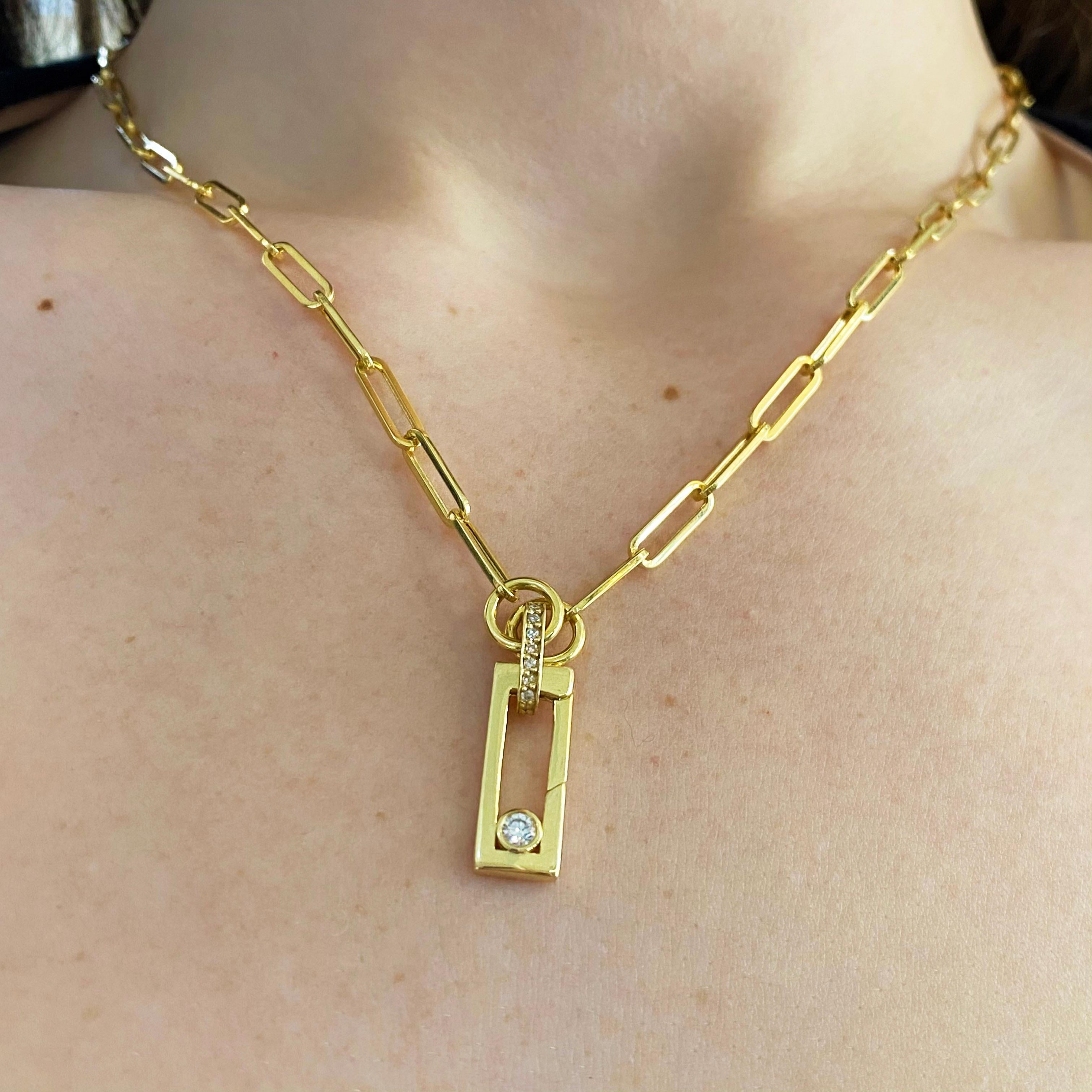 2022 is all about customizing your jewelry and to show your style! This gorgeous 14 karat yellow gold 3.6 millimeter, paperclip chain is the perfect necklace for the diamond lock and the diamond pendant. It flows well and shows that you are on top
