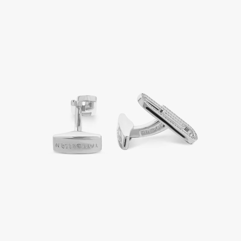 Paperclip Cufflinks with White Diamond in Sterling Silver

Quirky and unique, these paper clip cufflinks are sure to spark up a conversation. The sterling silver base is adorned with 158 pavé white diamonds (0.49ct) HI colour and SI quality, for a