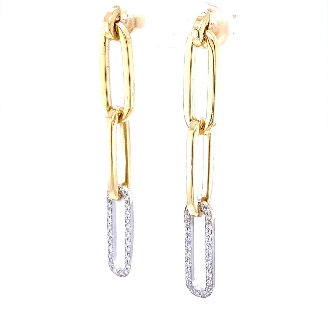 0.37 Carat Diamond 14 Karat Yellow Gold Paperclip Earrings

These on trend, yet classic earrings are sure to be a great addition to your accessory collection!  There are 52 Round Cut Diamonds that weigh 0.37 Carats (Clarity: VS2/Color: F).  
Made in