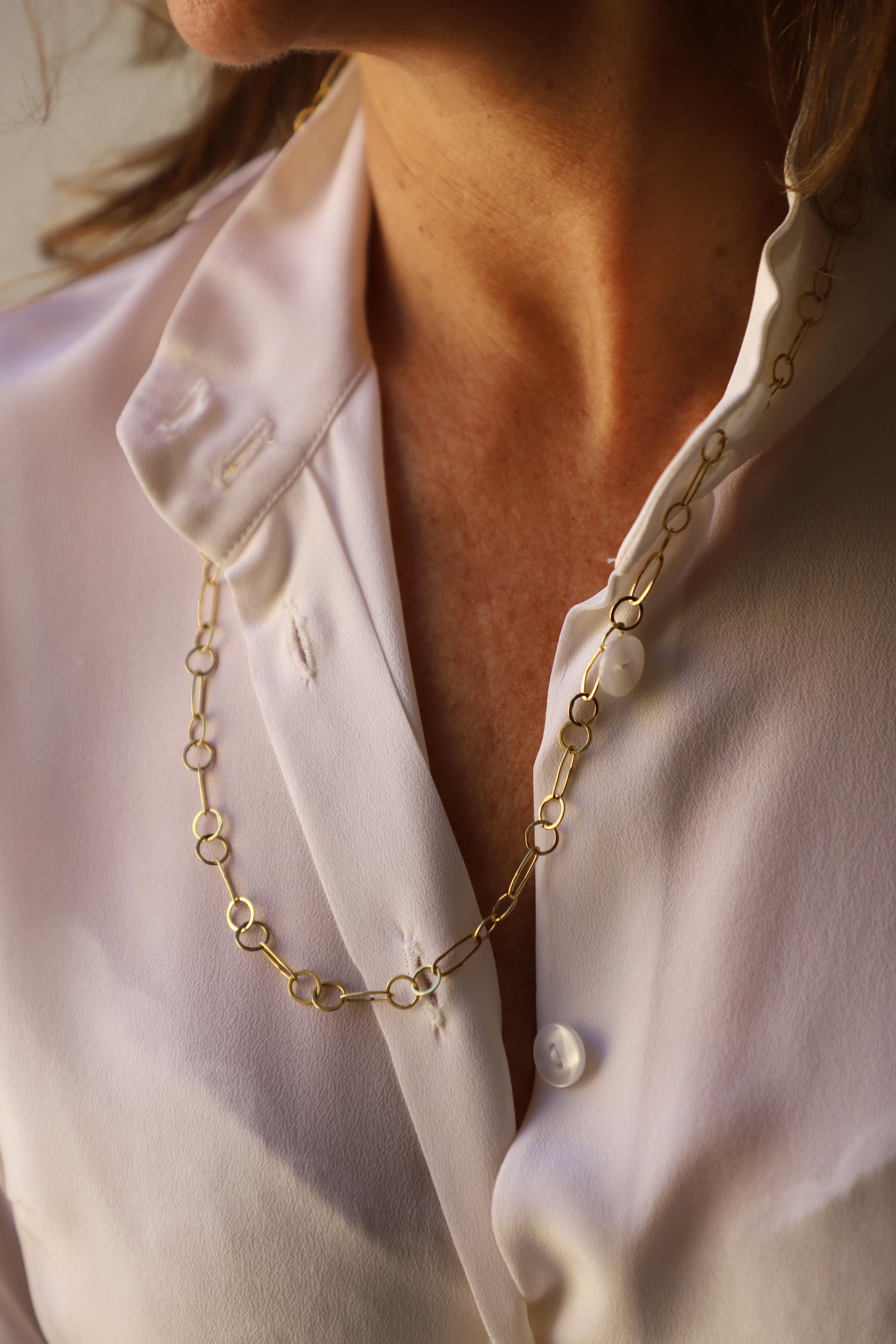 Rossella Ugolini Design Collection a Paperclip Links chain necklace hand made one by one , Slightly Hammered, in 18 Karat Yellow Gold 
A luminous unisex chain links necklace handcrafted in 18 karats yellow gold. Simple yet versatile, easy to match