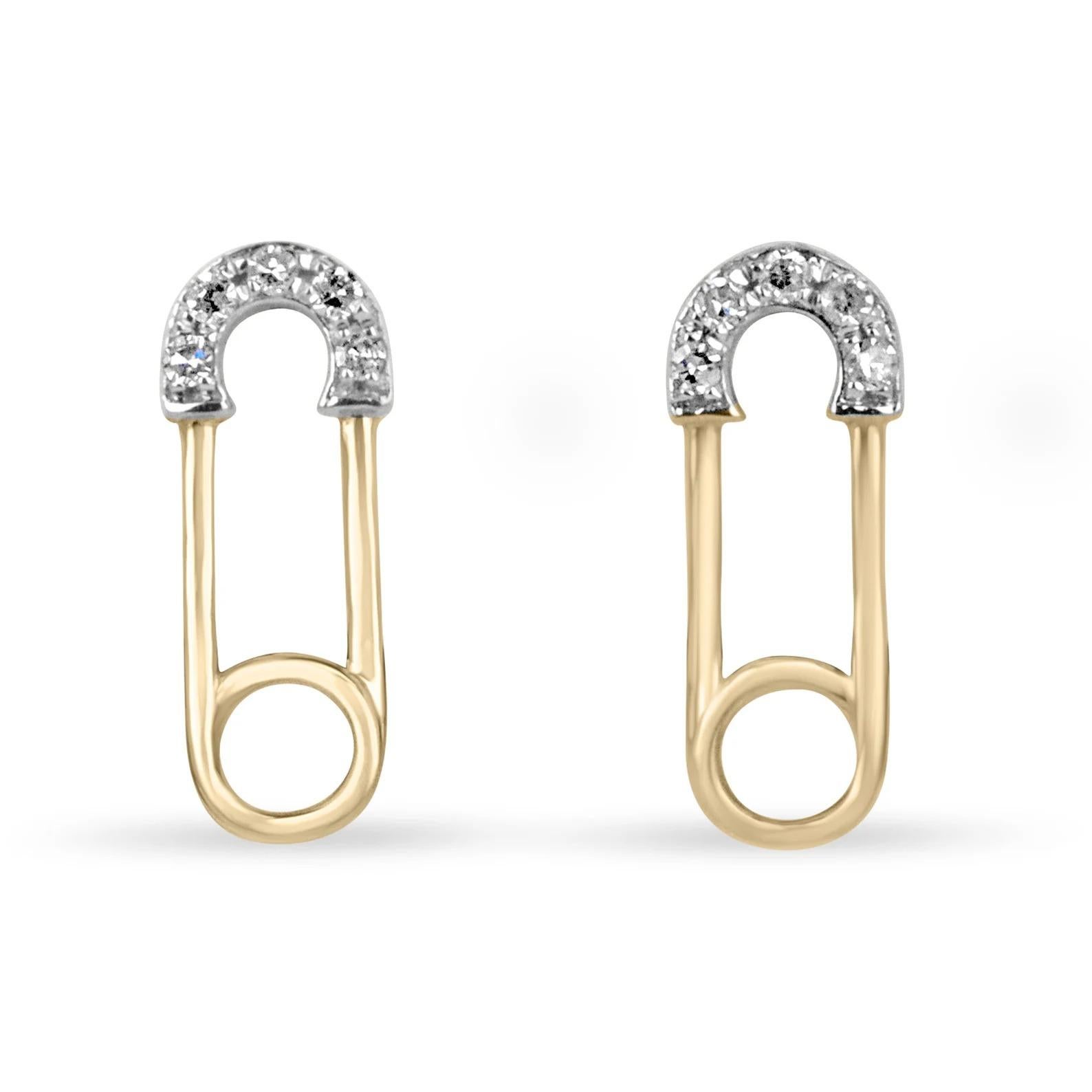 A trendy pair of diamond safety clip gold stud earrings. This petite pair showcases a detailed paperclip design, with a natural round-cut diamond rim accent; giving it a modern and trendy touch. Crafted in 14K gold, available in any color of choice.
