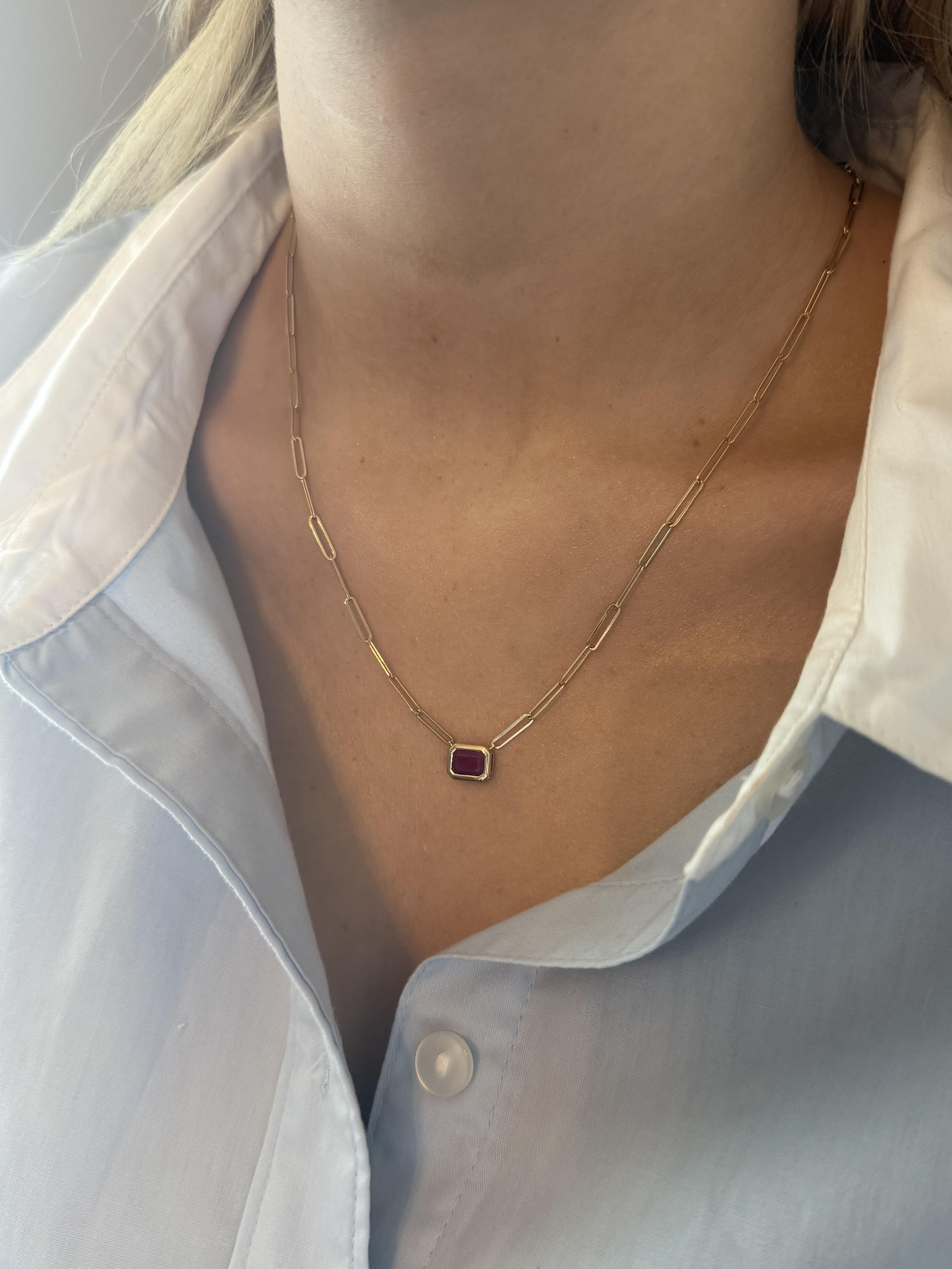We are loving these paperclip necklaces!!

Necklace Details
Material: 14K Yellow Gold
Chain Width: 2.4mm
Weight: 4.2 Grams
Length: 18 1/4 Inches
Can Be Shortened Upon Request

Accented by the following gemstone
1 - 7mm X 5mm Emerald Cut Red Ruby