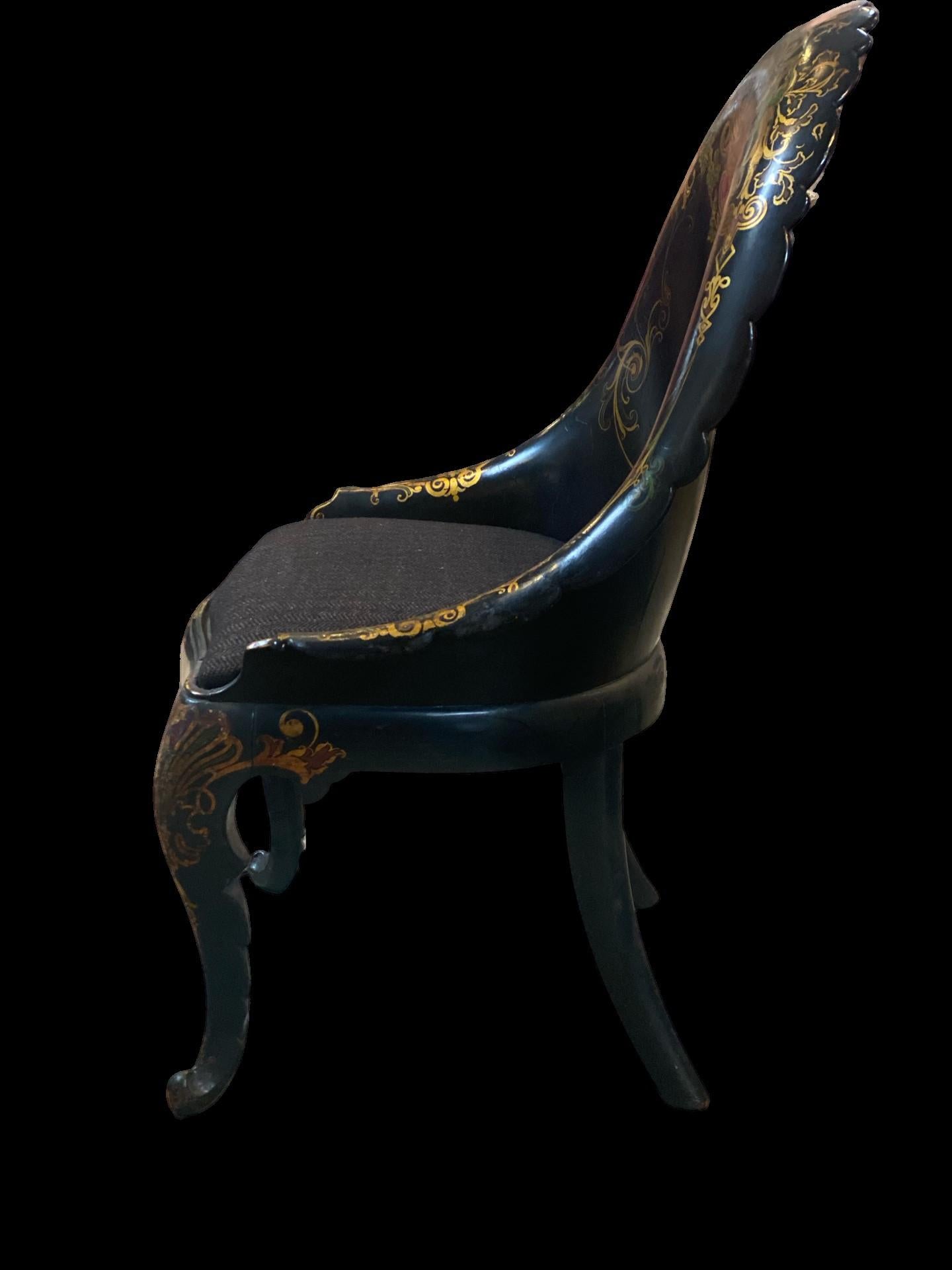 English Papier-mâché 19th century gold leaf detail chair.
