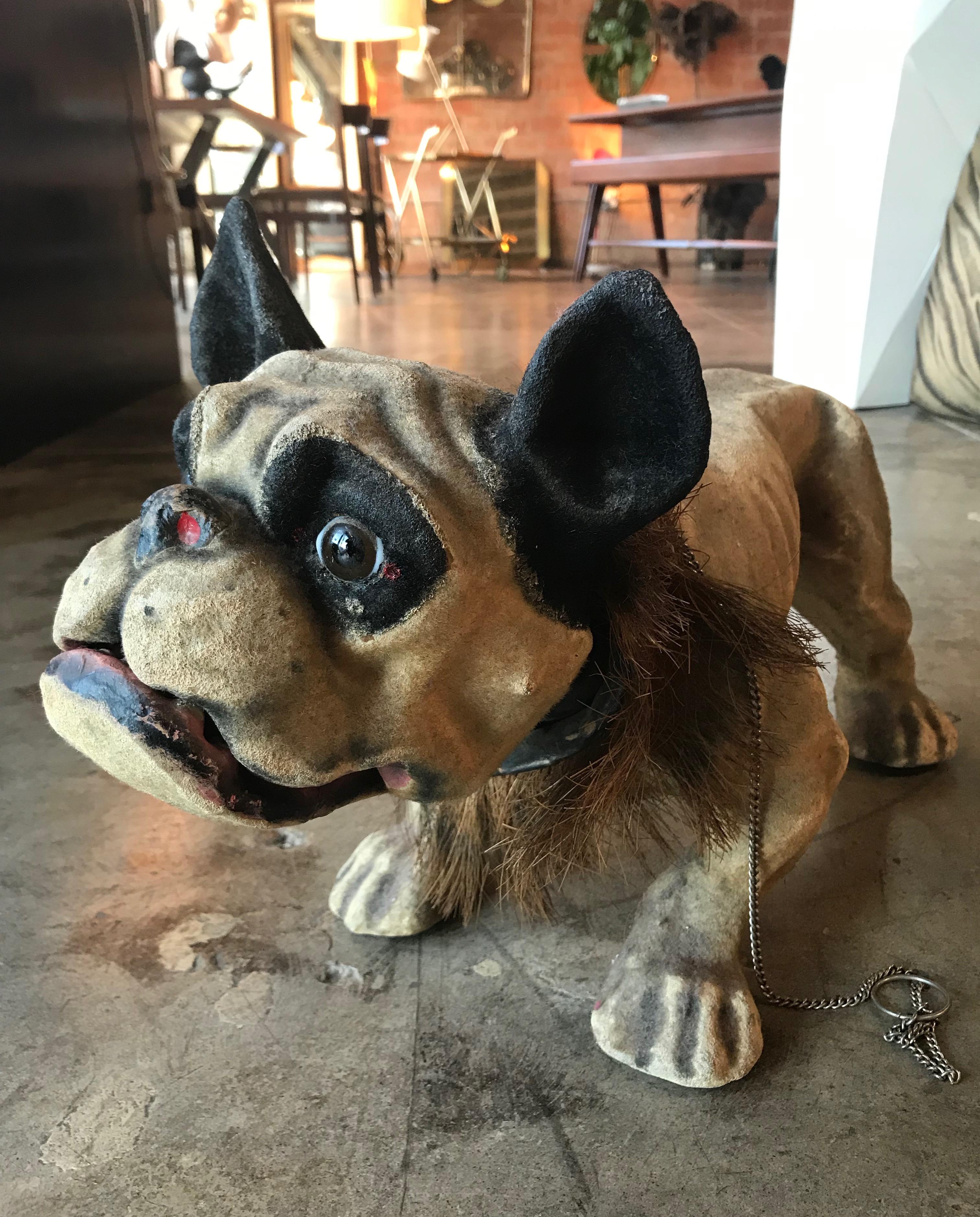 Papier Maché ‘Growler’ bulldog pull toy, France, circa 1900
-working growling mechanism-
Papier maché, glass, paint, metal chain.