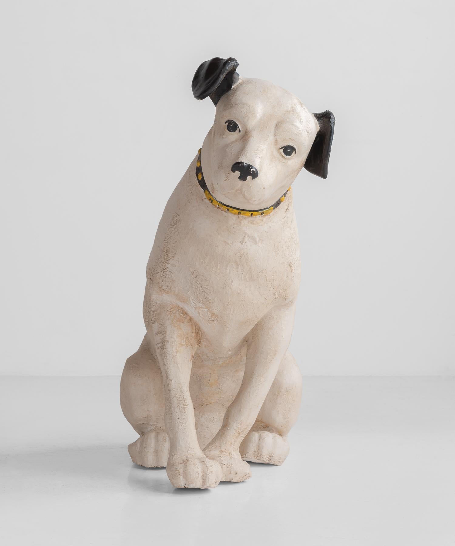 Papier mâché RCA victory nipper dog, circa 1920.

Folk art sculpture of a dog used for display. Papier mâché with delicately crafted features and original paint.