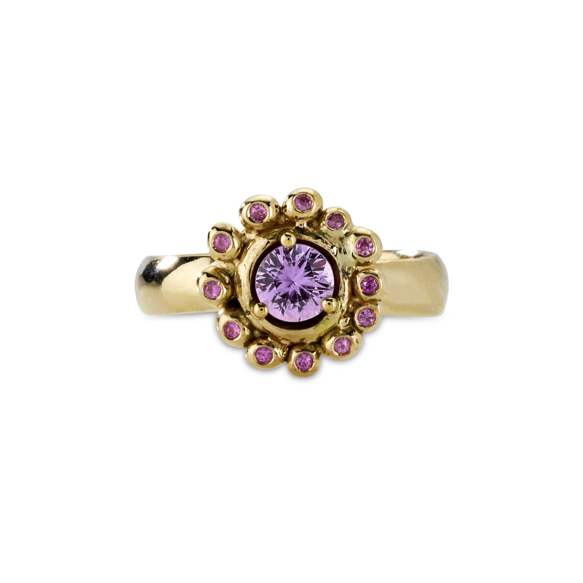 Papillon Ring, 14 Karat Yellow Gold with Australian Purple and Pink Sapphires
Handcrafted and individually cast in solid gold. Olivia carves each piece from wax, making these items unique, which we believe is what gives them their beauty. The