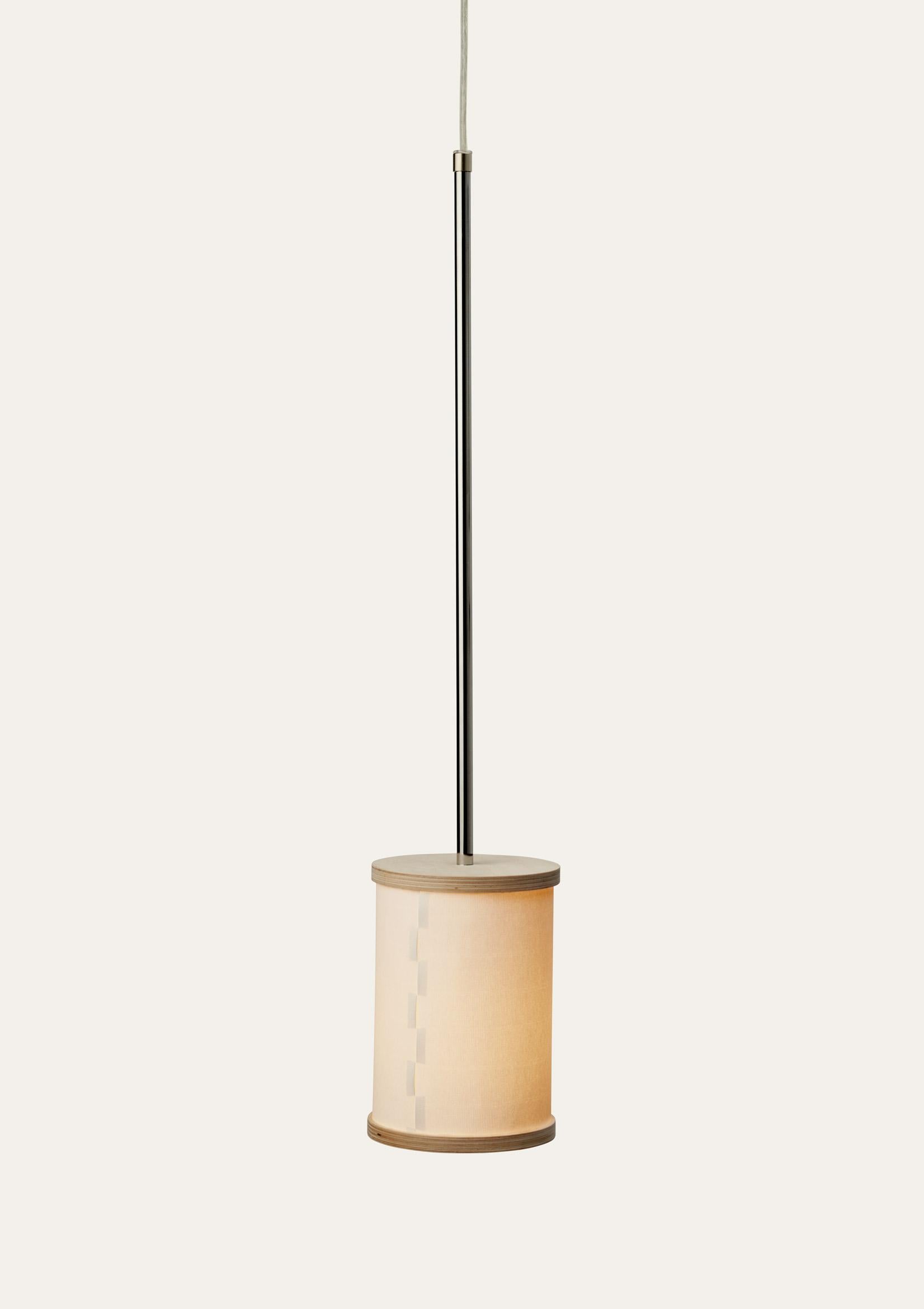Papp pendant lamp by Storängen Design
Dimensions: D 20 x W 13.5 x H 75 cm
Materials: birch plywood, watercolor paper, metal.

A simple yet elegant pendant lamp in plywood and watercolor paper. The screen’s composition is inspired by a dovetail