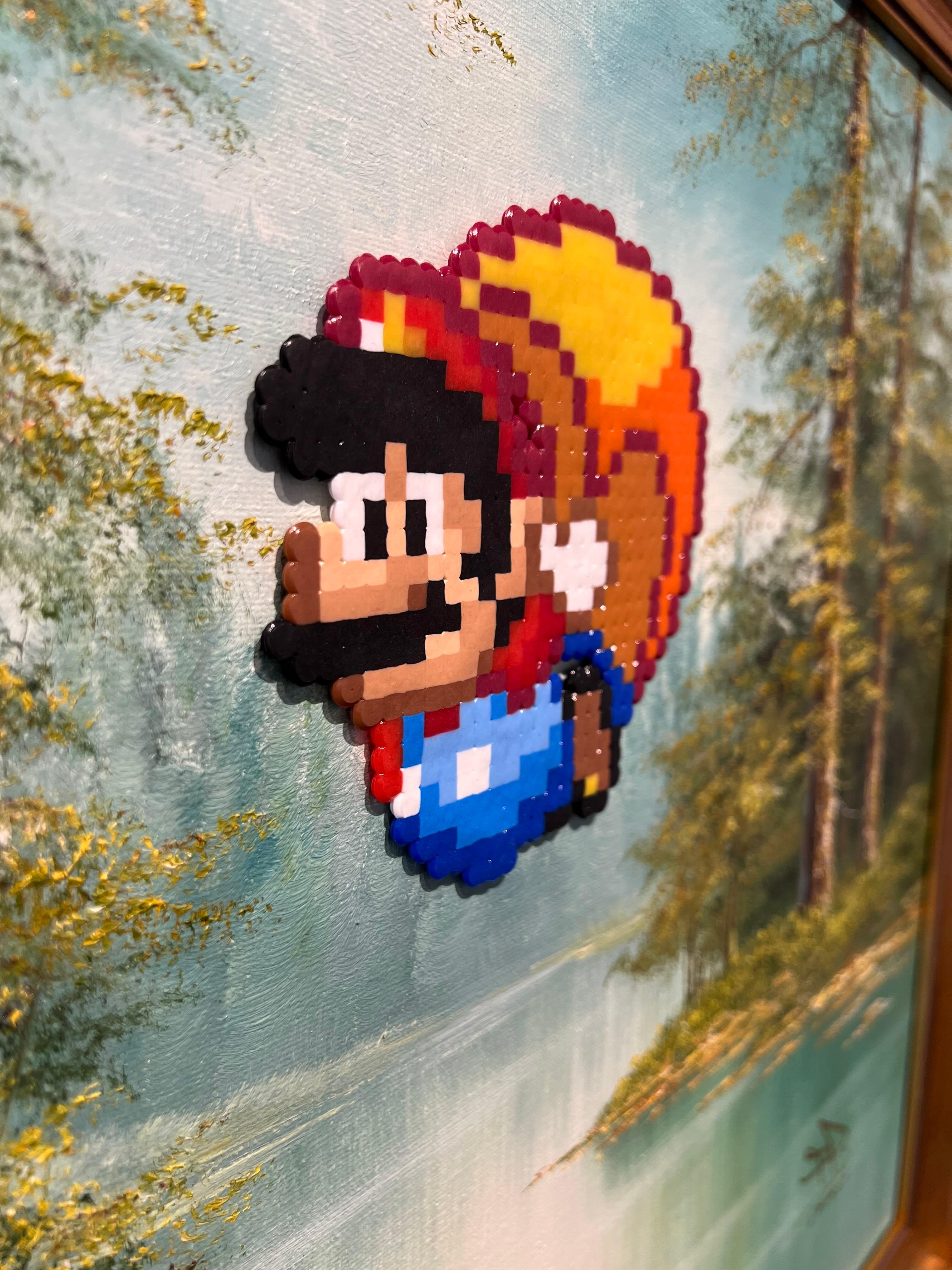 Un'opera d'arte tridimensionale realizzata a mano utilizzando perline Perler e tecniche miste in un dipinto trovato incorniciato.

L'artista vive e lavora in Svezia ed è rappresentata dalla Krause Gallery di New York.