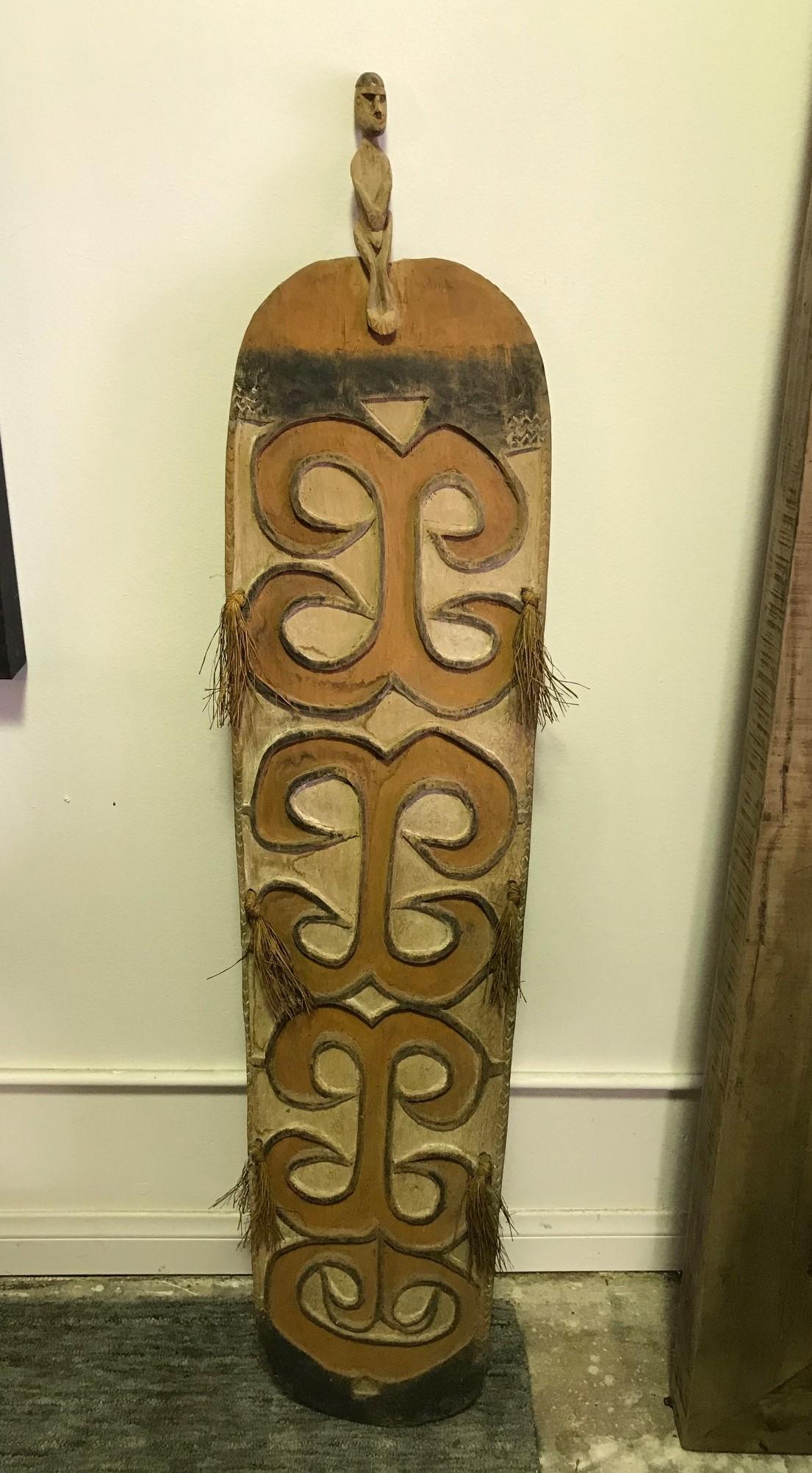 Papua New Guinea Irian Jaya Indonesia Asmat Carved Wood Shield, 19th Century In Good Condition In Studio City, CA