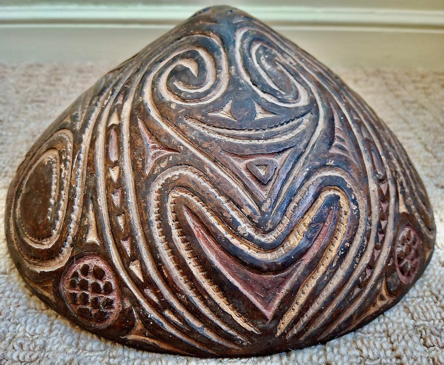 This Kamana or Sago Bowl was likely made by the Sawos people of the Middle Sepik River region in Papua New Guinea. Just as we in the west would use a large round bowl adorned with tomato or olive leaf motifs for specifically serving pasta, this