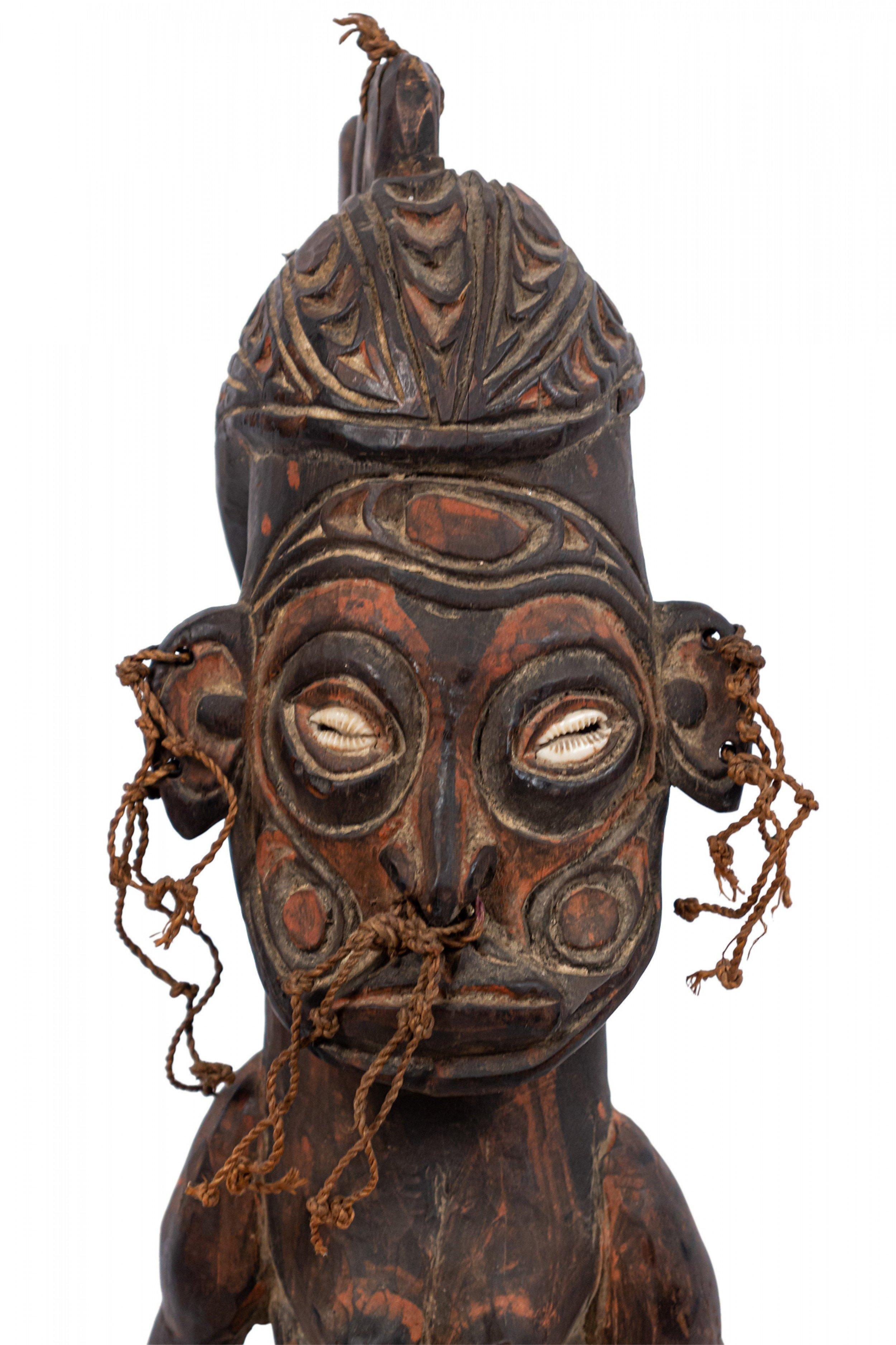 Hand-Carved Papua New Guinean Polychromed Carved Figure For Sale