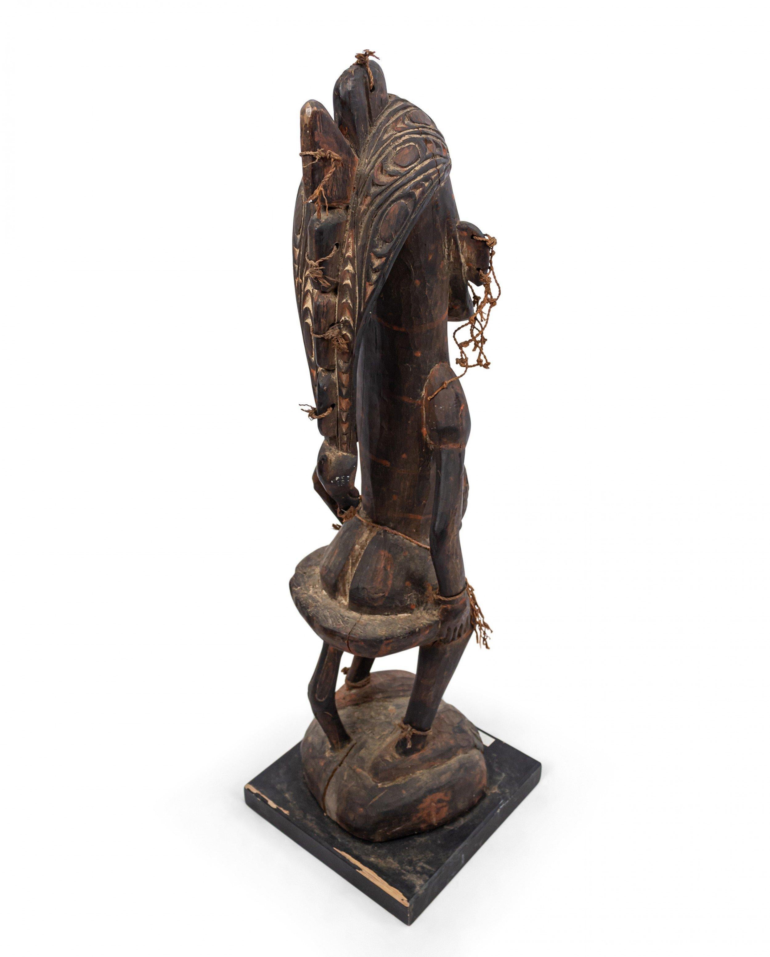 20th Century Papua New Guinean Polychromed Carved Figure For Sale