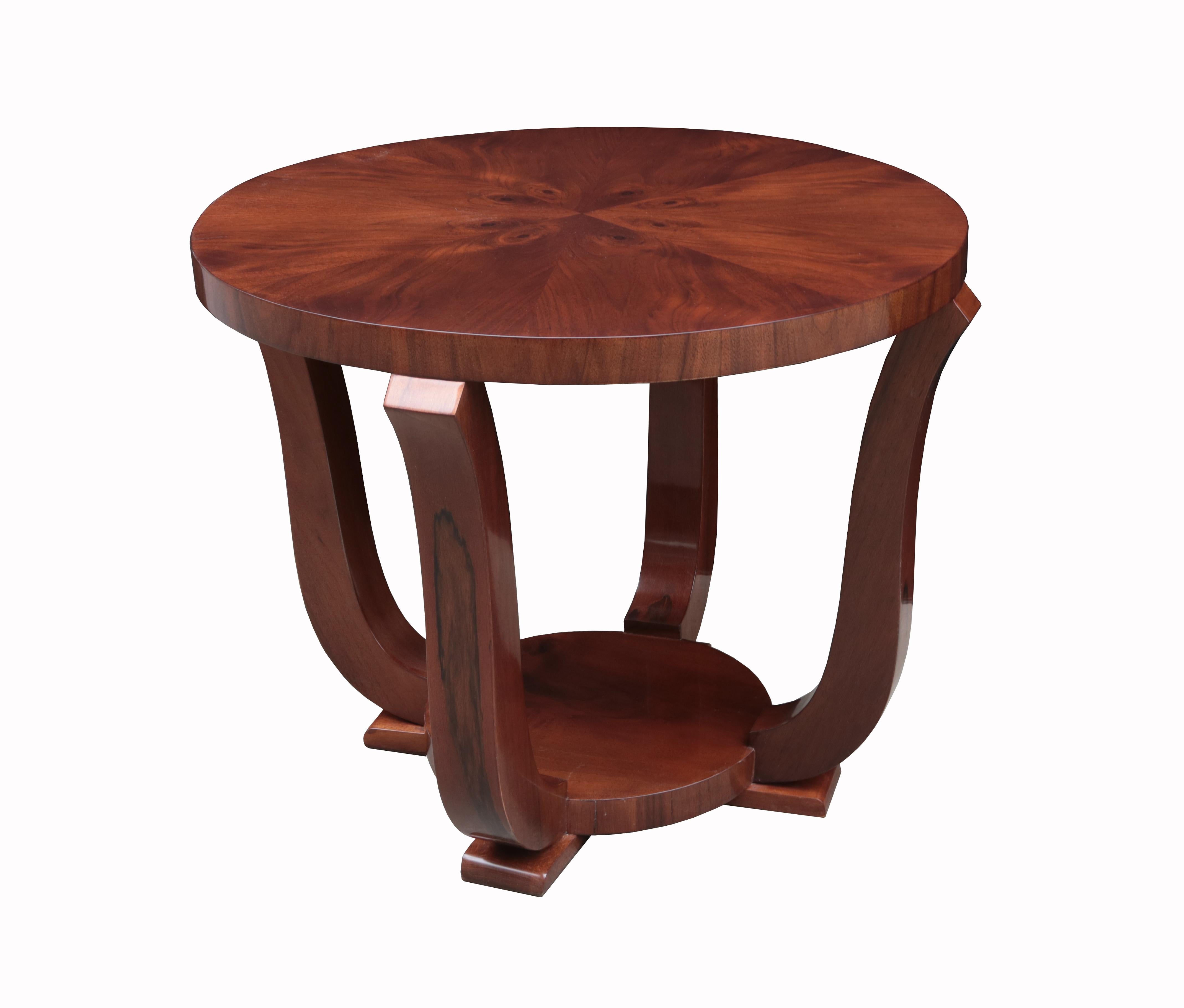 A pair of Art Deco round
Two-tier side tables.
Walnut.
  