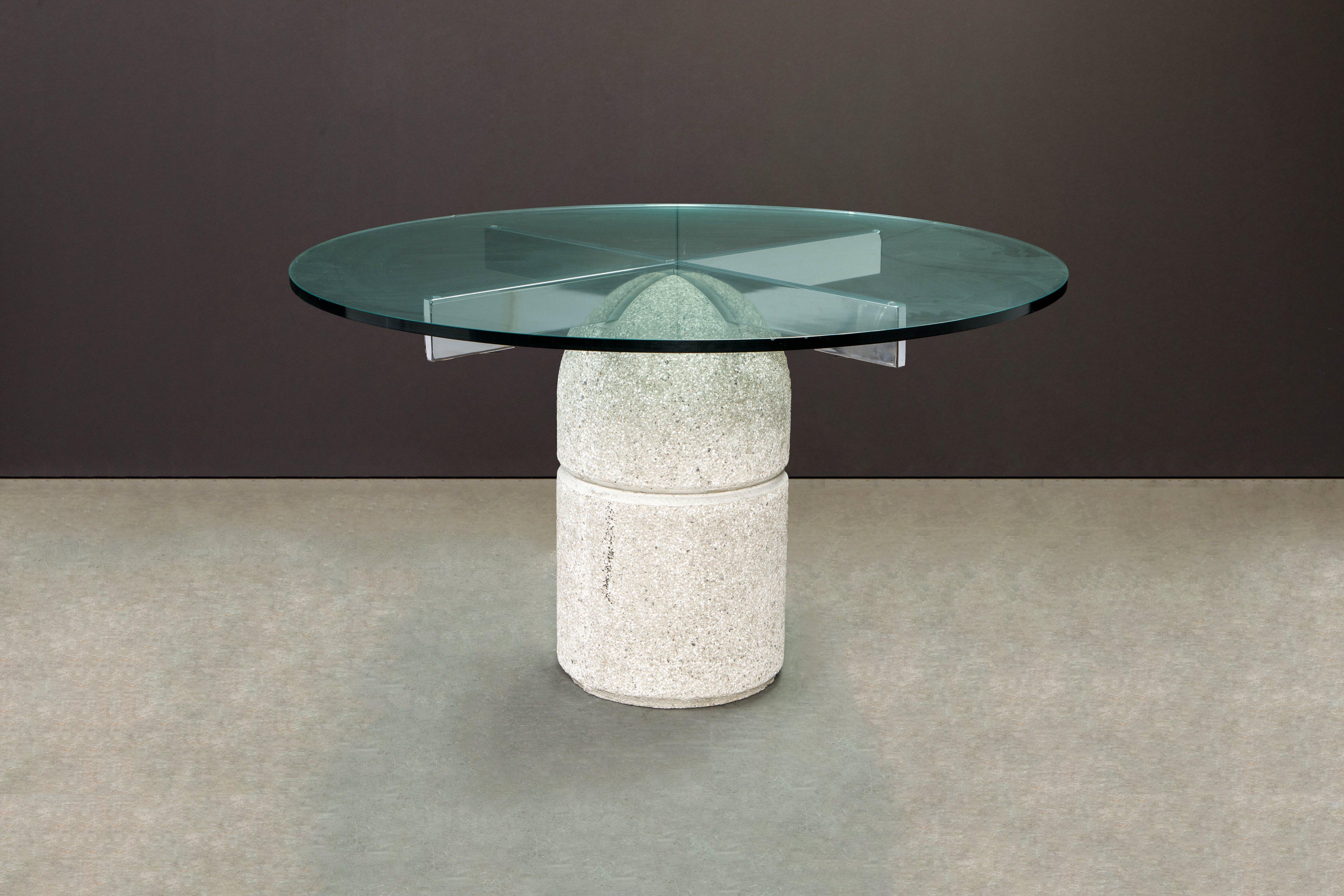 This sleek modern 'Paracarro' dining table by Giovanni Offredi for Saporiti Italia was sculpted from concrete and chromed steel during the 1970s in Italy. A .75