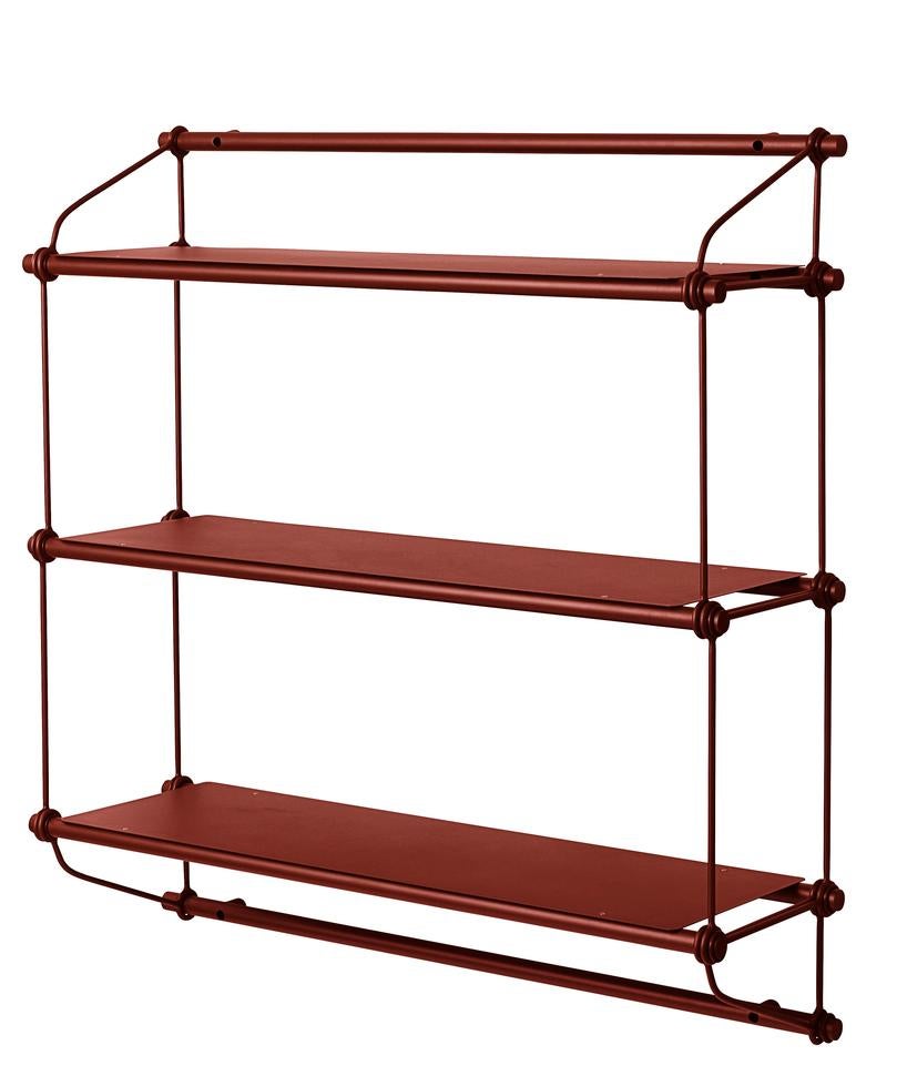 Parade 3 shelves Oxide Red by Warm Nordic
Dimensions: D100 x W30 x H104 cm
Material: Powder coated steel
Weight: 12 kg
Also available in different colours and dimensions. 

Elegant metal shelving unit with plenty of space for all your