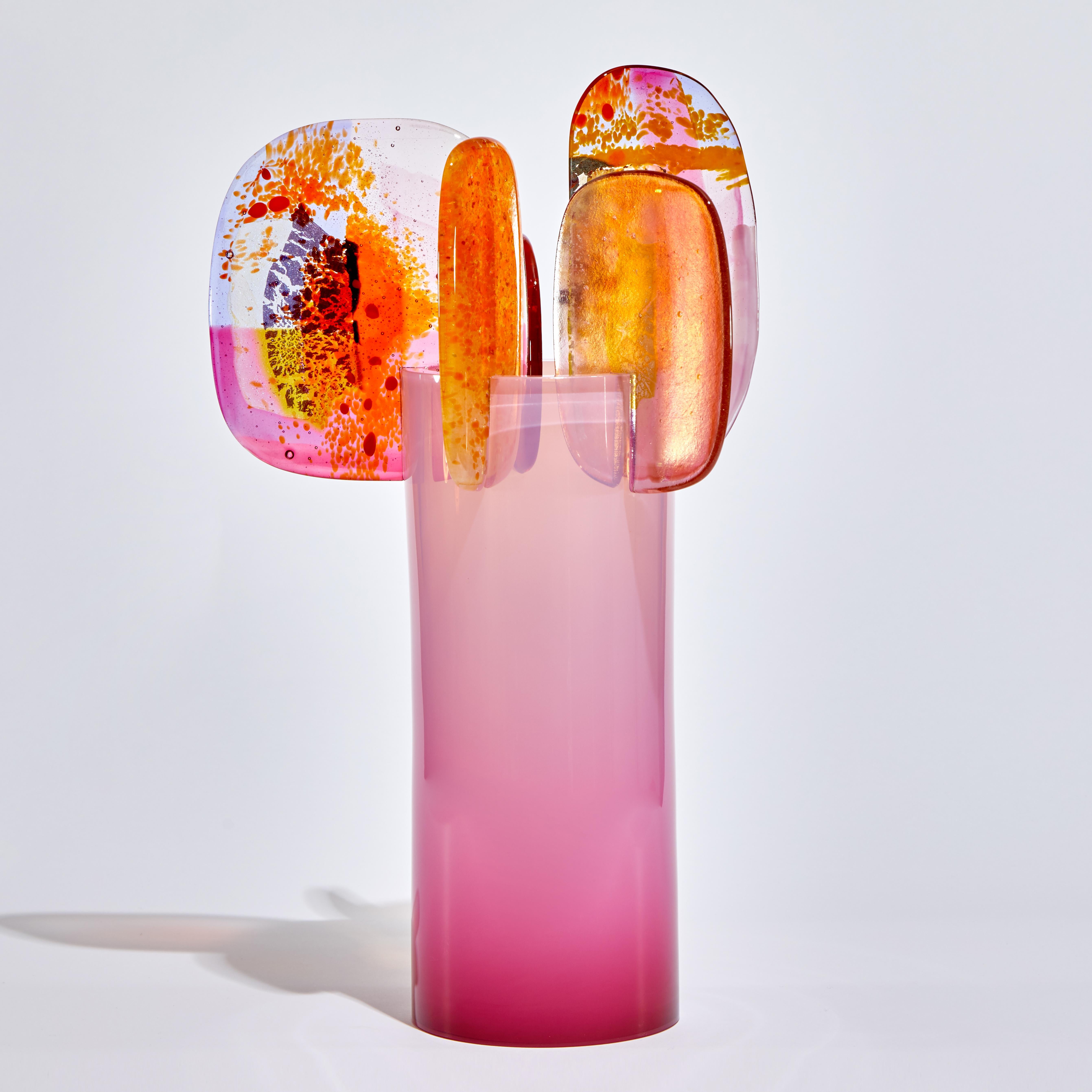 'Paradise 01 in Pink' is a unique glass sculpture created using hybrid hand-made glass techniques by the British artist Amy Cushing. Combining mouth blown glass with kiln formed glass, each piece within the collection displays a multiple of highly
