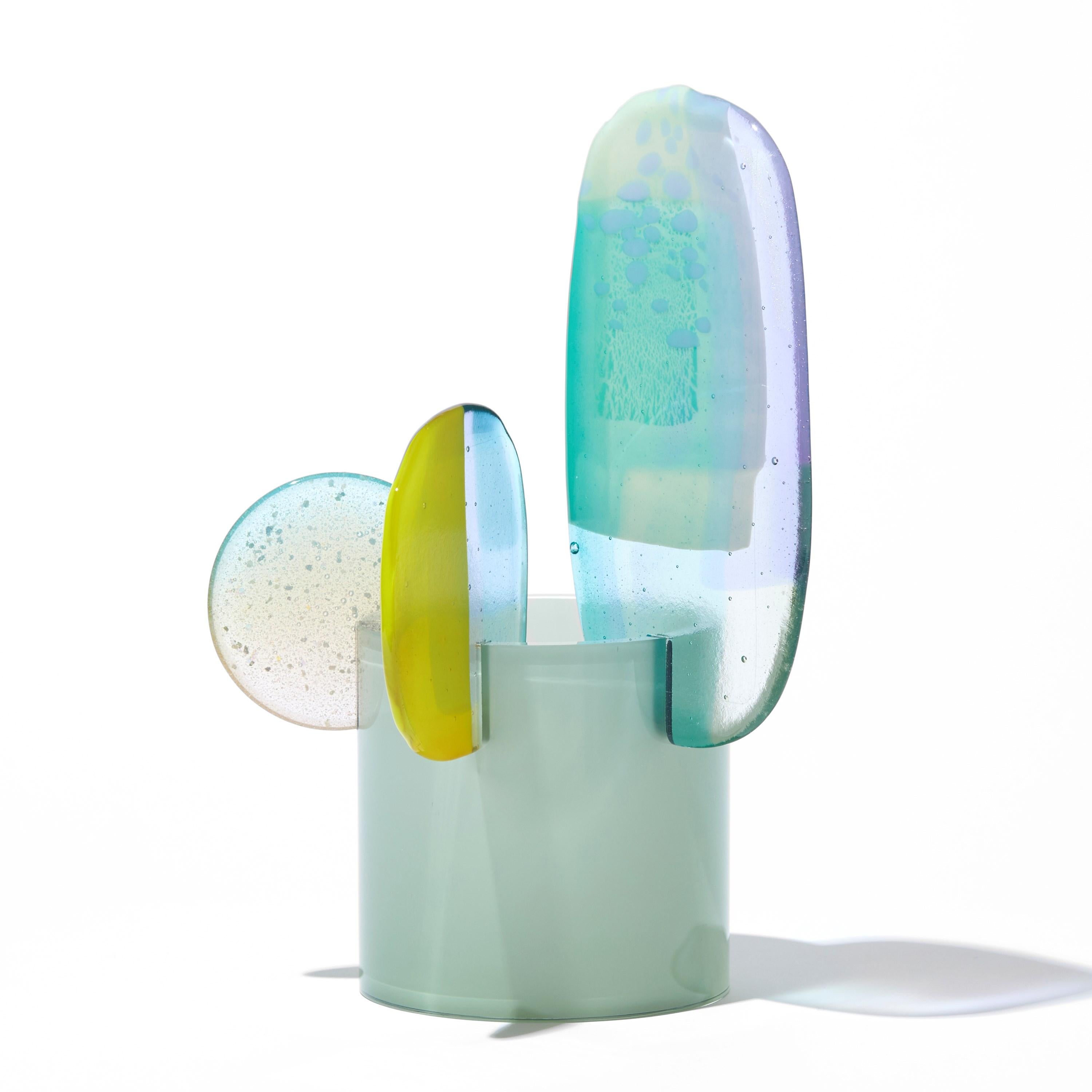 'Paradise 08 in Celadon' is a unique glass sculpture created using hybrid hand-made glass techniques by the British artist Amy Cushing. Combining mouth blown glass with kiln formed glass, each piece within the collection displays a multiple of