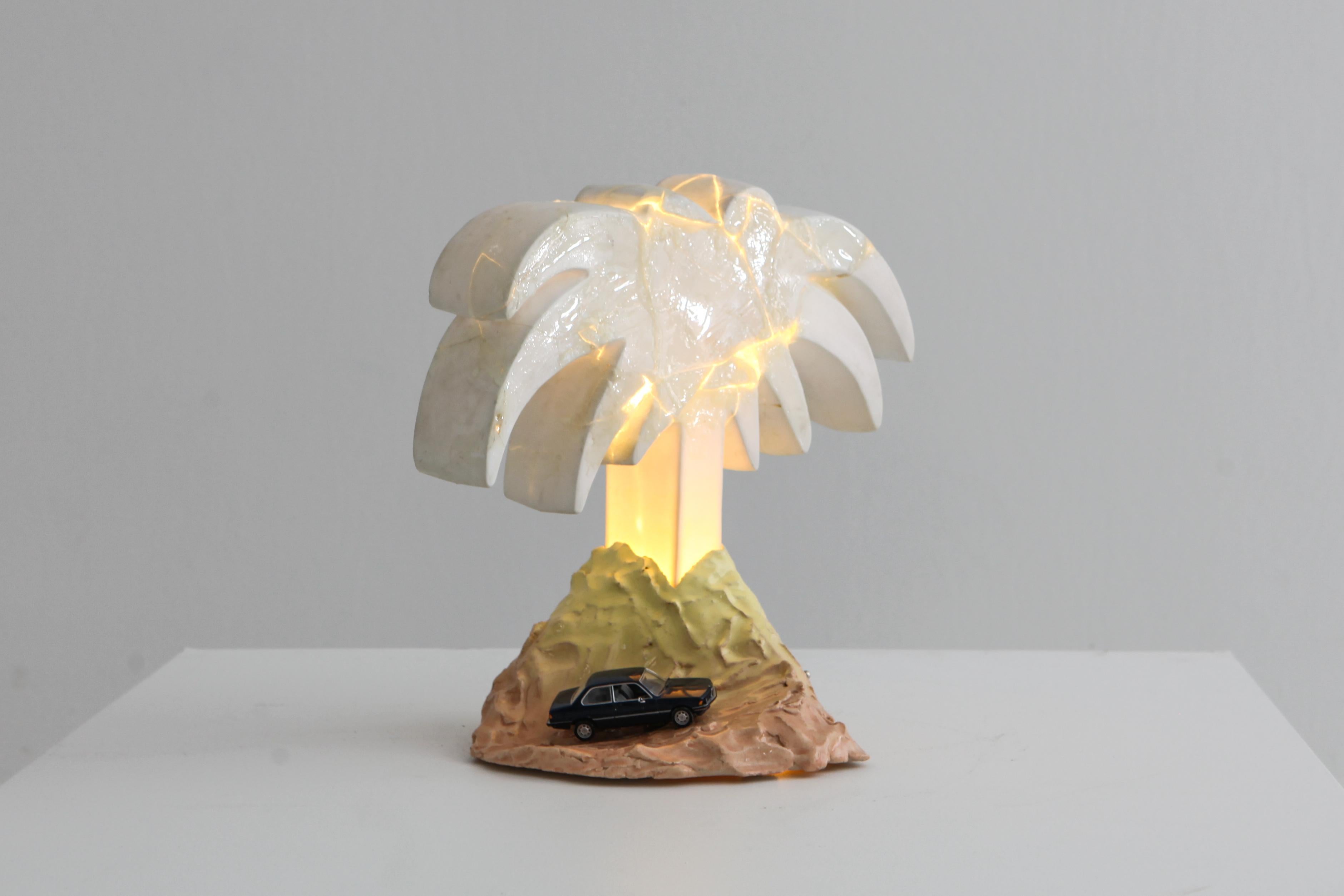 Functional art piece by Daan Gielis, 2019.

Porcelain palm tree table light on ceramic base with electric car

the artist purposely broke and reglued the porcelain

Part of a series of three different unique light sculptures.


 
