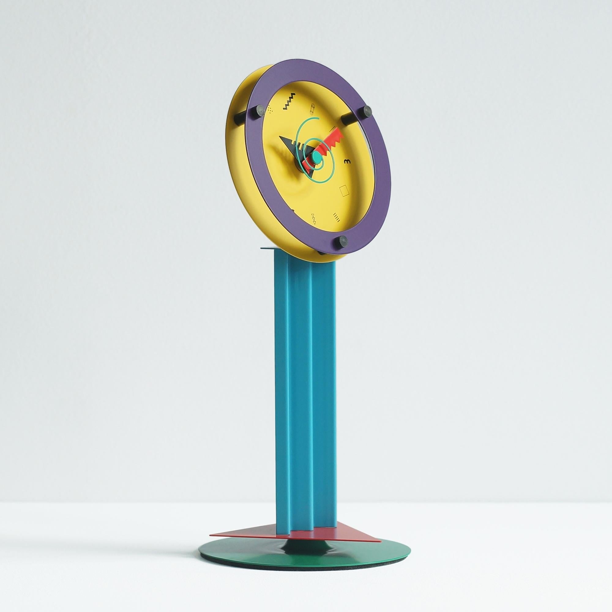 Paradise stand clock by Wakita hi-tecs, Japan. Wakita hi-tecs produced a lot of small pieces in the 1980s-1990s under the name of superpresent. Especially Shohei Mihara's clock series are famous.
 