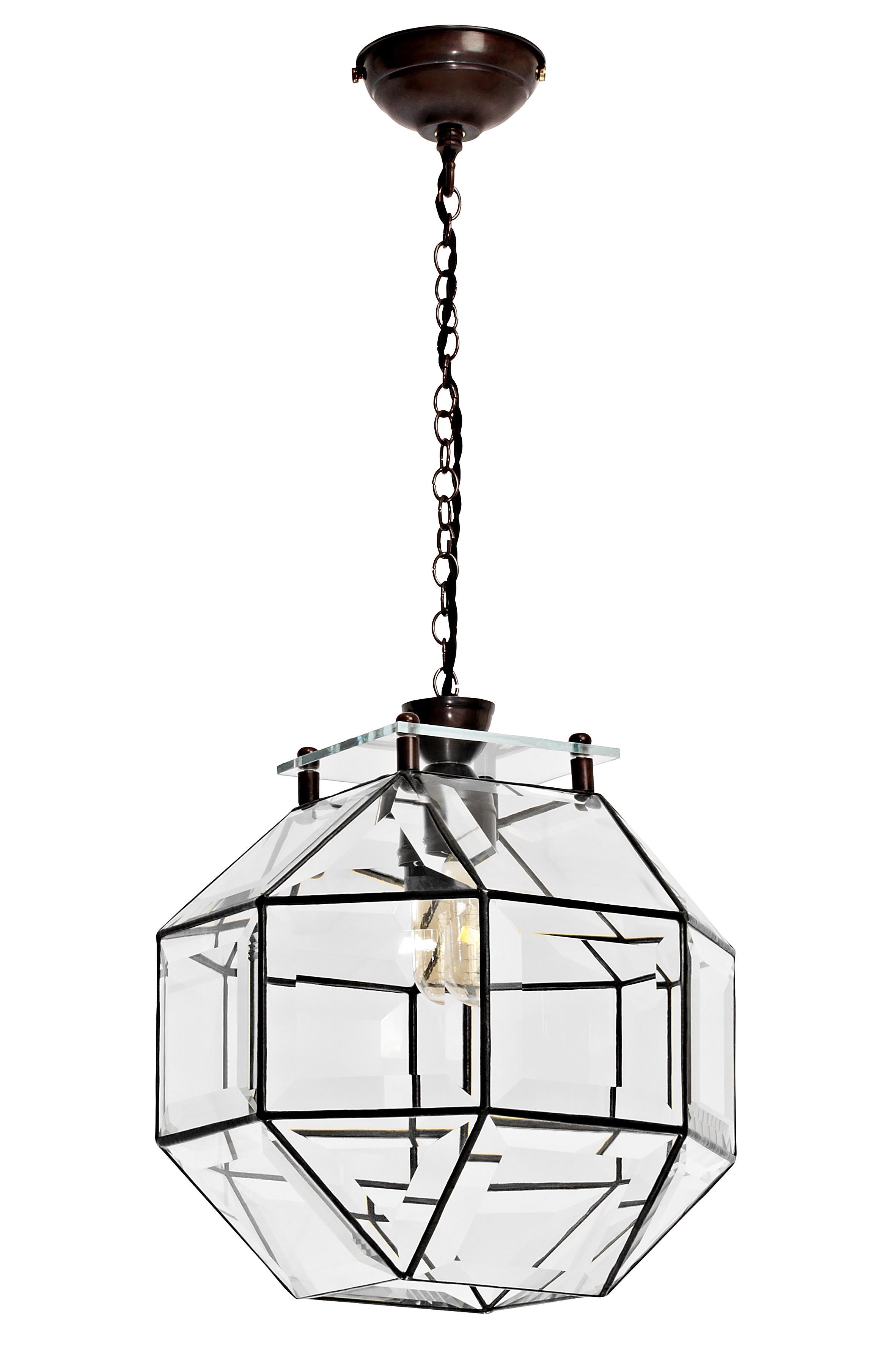 Paragon pendant by CTO Lighting
Materials: bronze with bevelled glass and bronze oval chain
Dimensions: H 30 x W 30 cm 

All our lamps can be wired according to each country. If sold to the USA it will be wired for the USA for instance.
Other