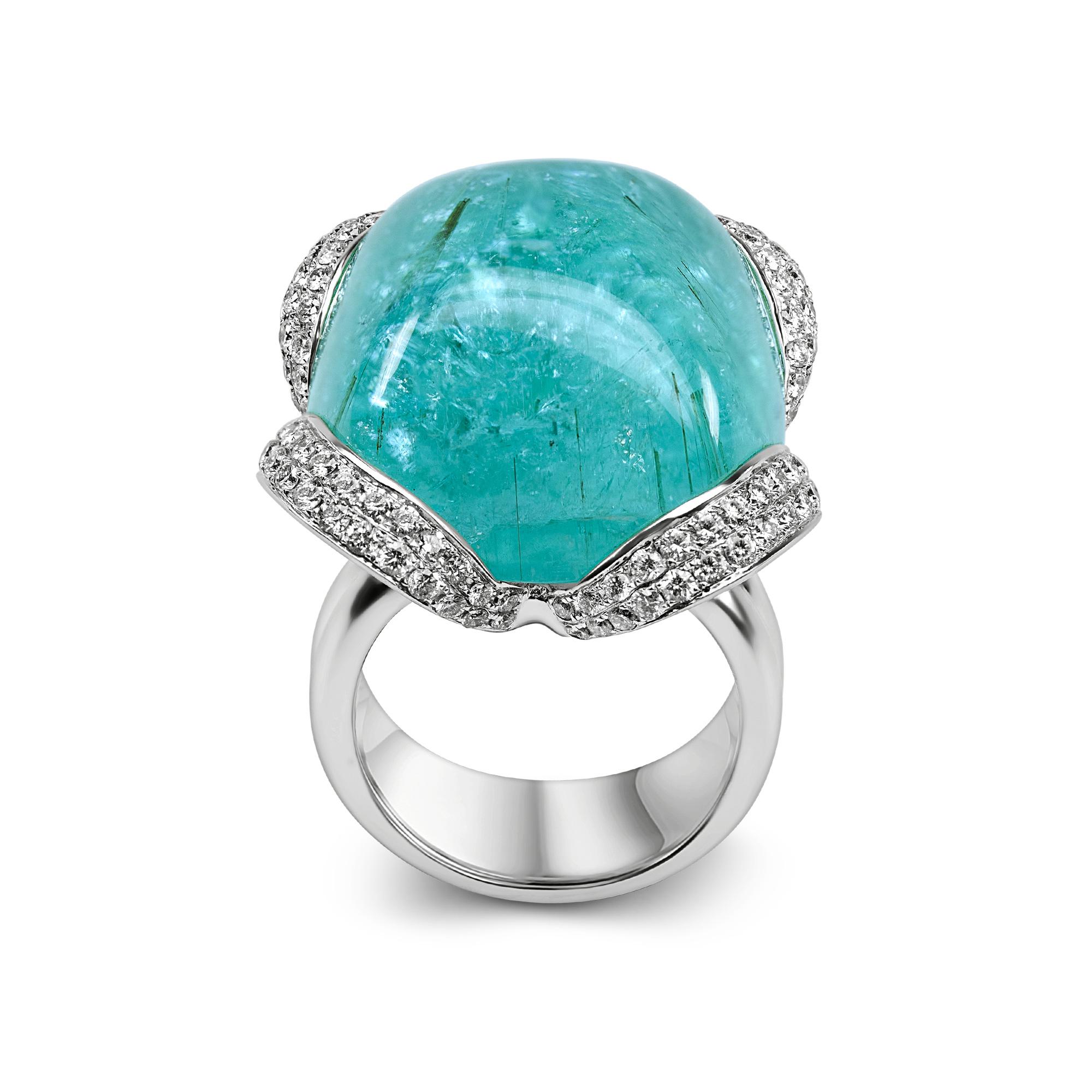 Certified 56.21 Carat Paraiba Tourmaline Cabochon 18K Gold Cocktail Ring

A contemporary ring made of 18k white gold and set with:
- A cushion shaped Paraiba cabochon weighing a total of 56.21 ct
- 120 white diamants weighing a total of 1.24 ct

The