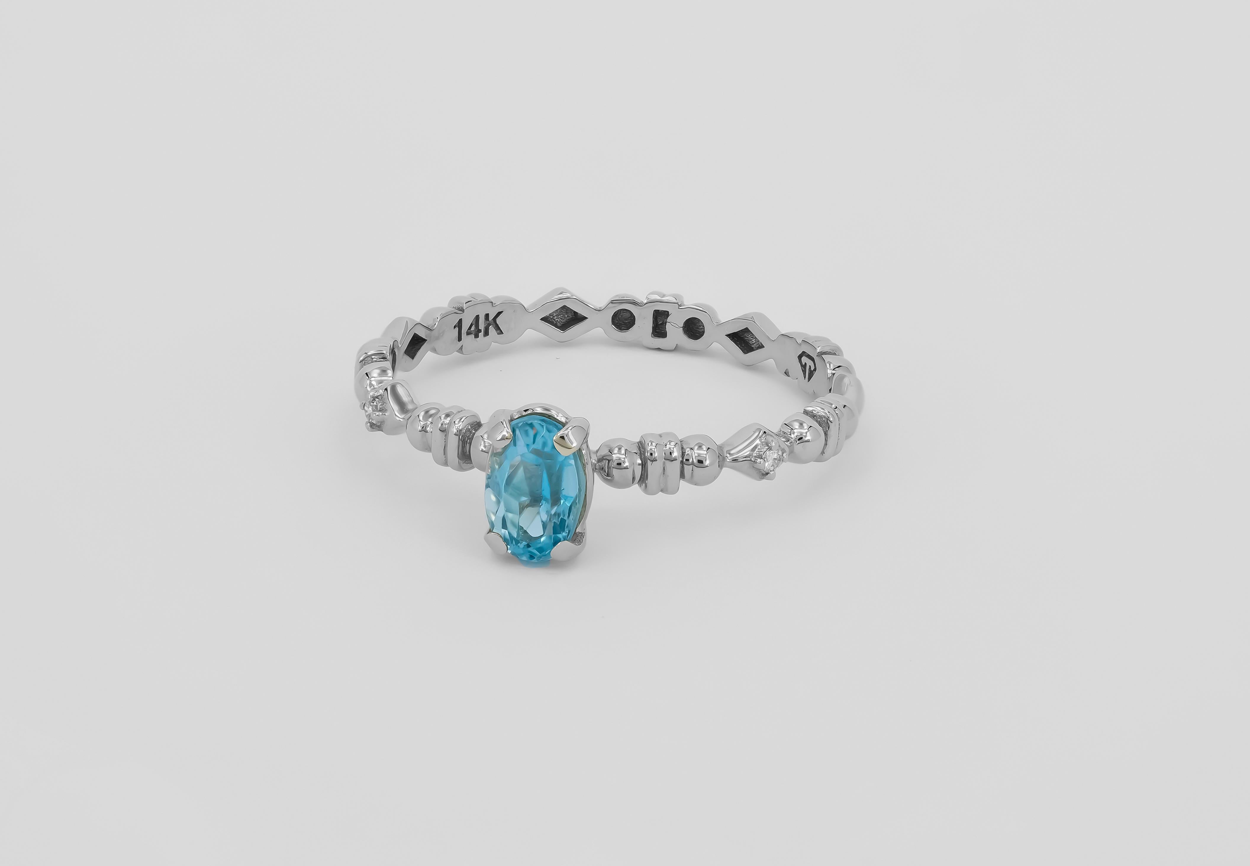 Oval Cut Paraiba color apatite 14k gold ring.  For Sale