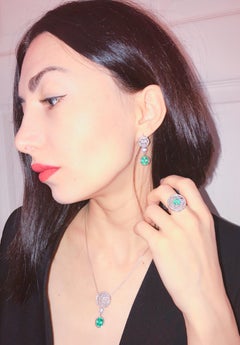 Orecchini in apatite color Paraiba e diamanti in oro 14k