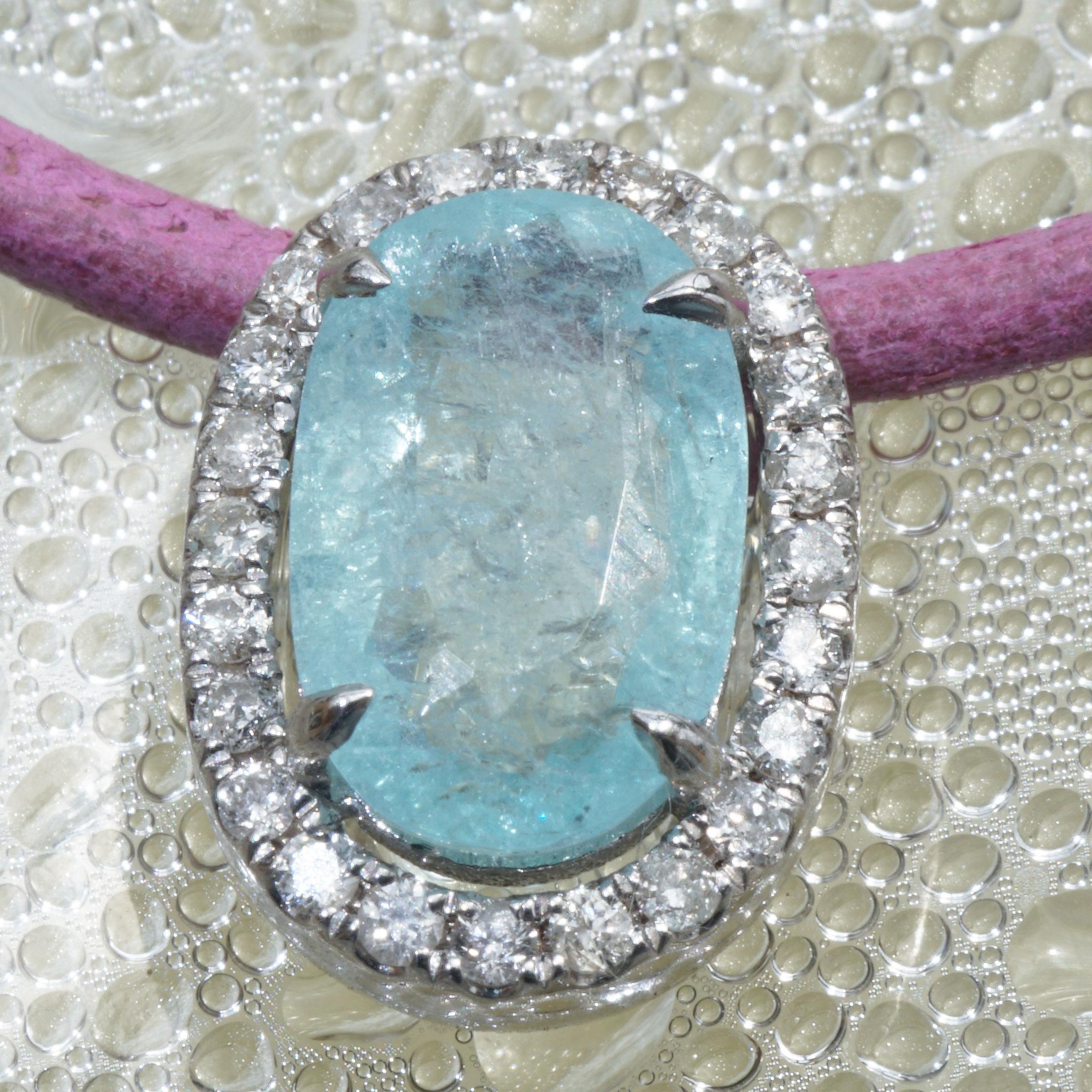 who doesn't love the Paraiba tourmaline in the exceptional color swimming pool blue, with the Schmuckzicke logo, worked in 750 white gold, the star is the said oval Paraiba Tourmaline as pendant approx. 1. 75 ct, swimming pool blue, 10 x 6,5 mm,