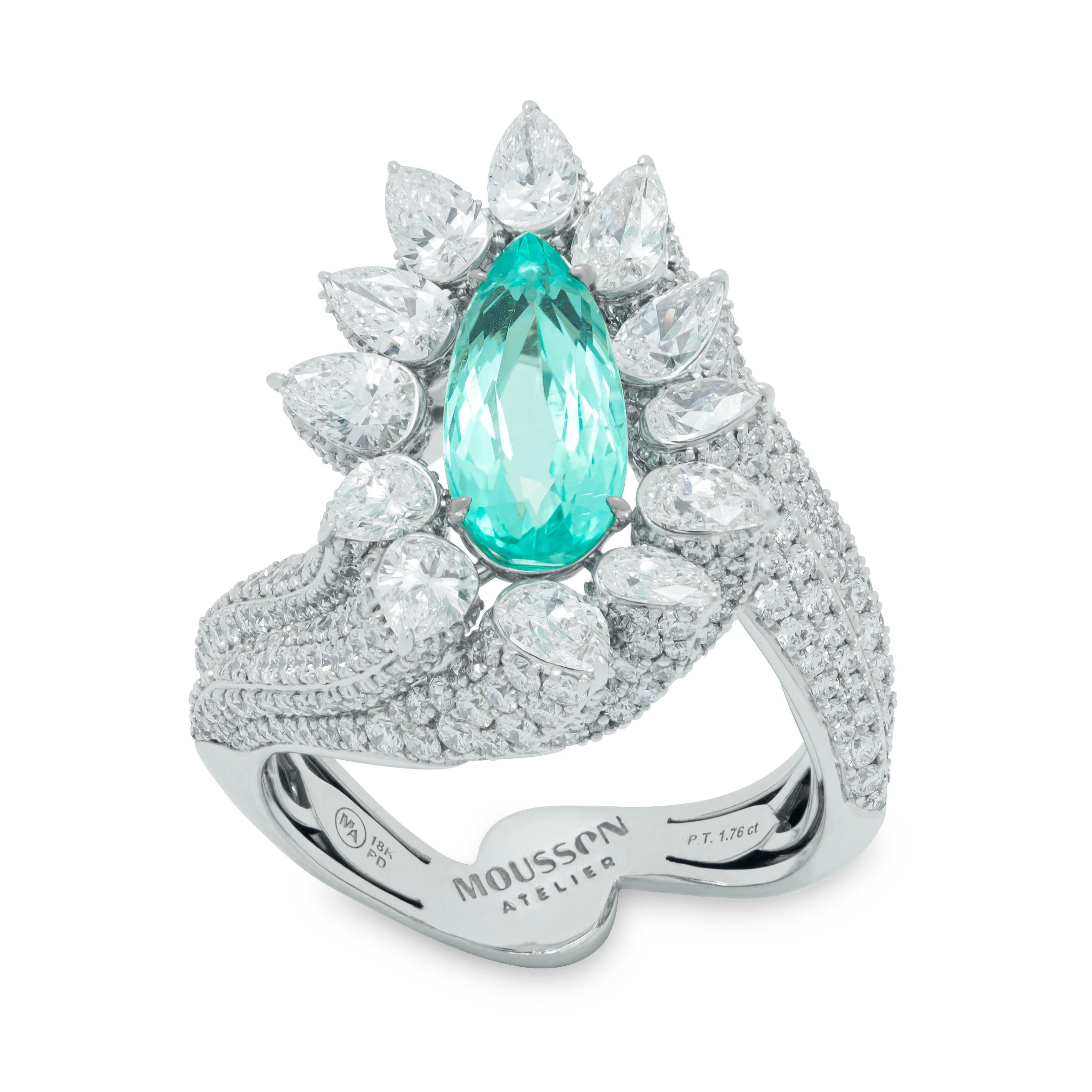 Paraiba Tourmaline 1.76 Carat Diamond 18 Karat White Gold High Jewelry Ring

This 18K White Gold, Paraiba Tourmaline, and Diamonds Ring is a stunning addition to any jewelry collection. Central stone set as the base of the ring - an incredible