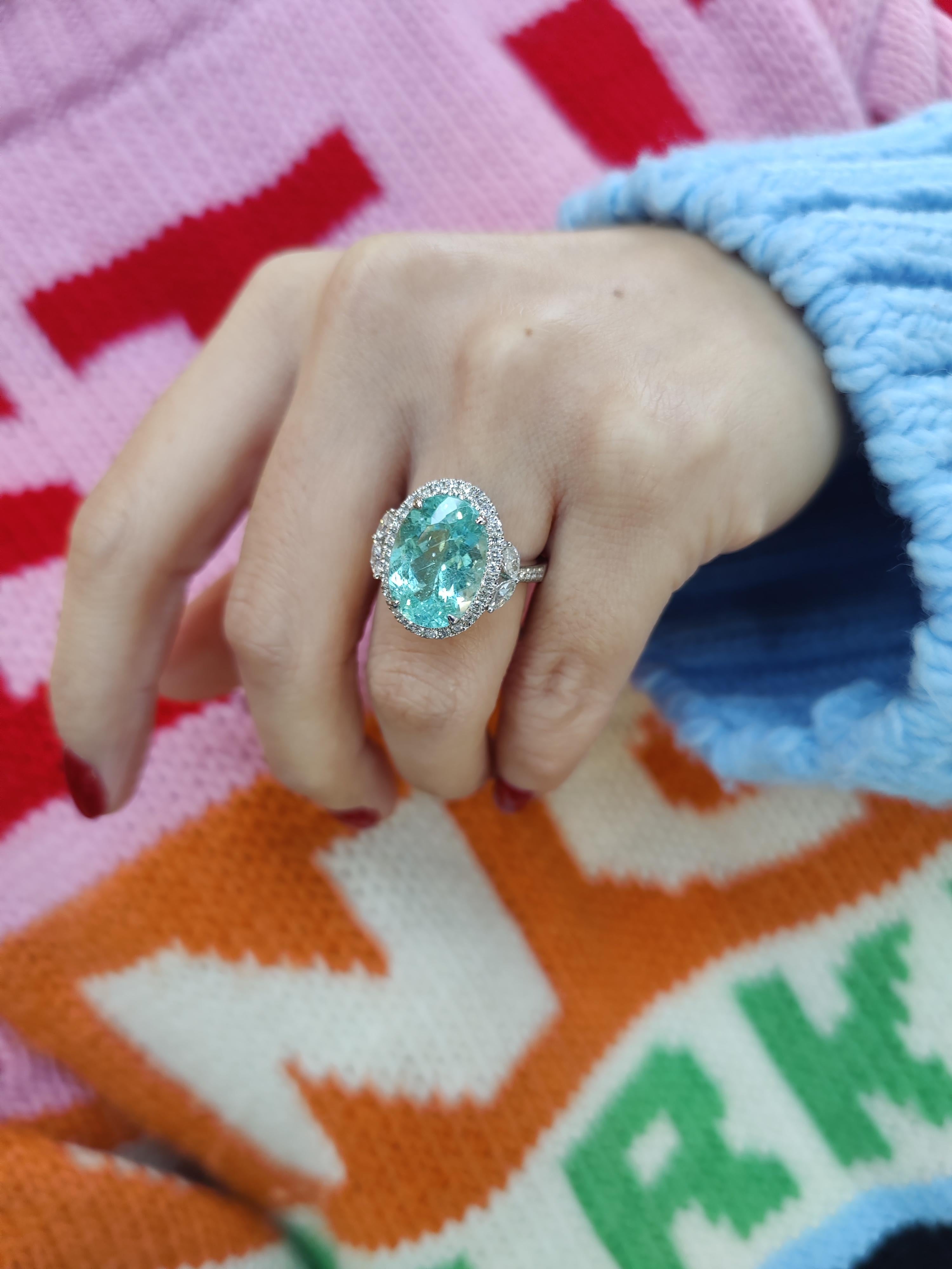 Mesmerizing Paraiba Tourmaline Ring 8 carats.
This astounding white gold ring with a Paraïba tourmaline of 8.08 carats will be turning heads. The ring also holds 0.38 carats of marquise-cut diamonds and 0.61 crts of brilliant-cut diamonds.