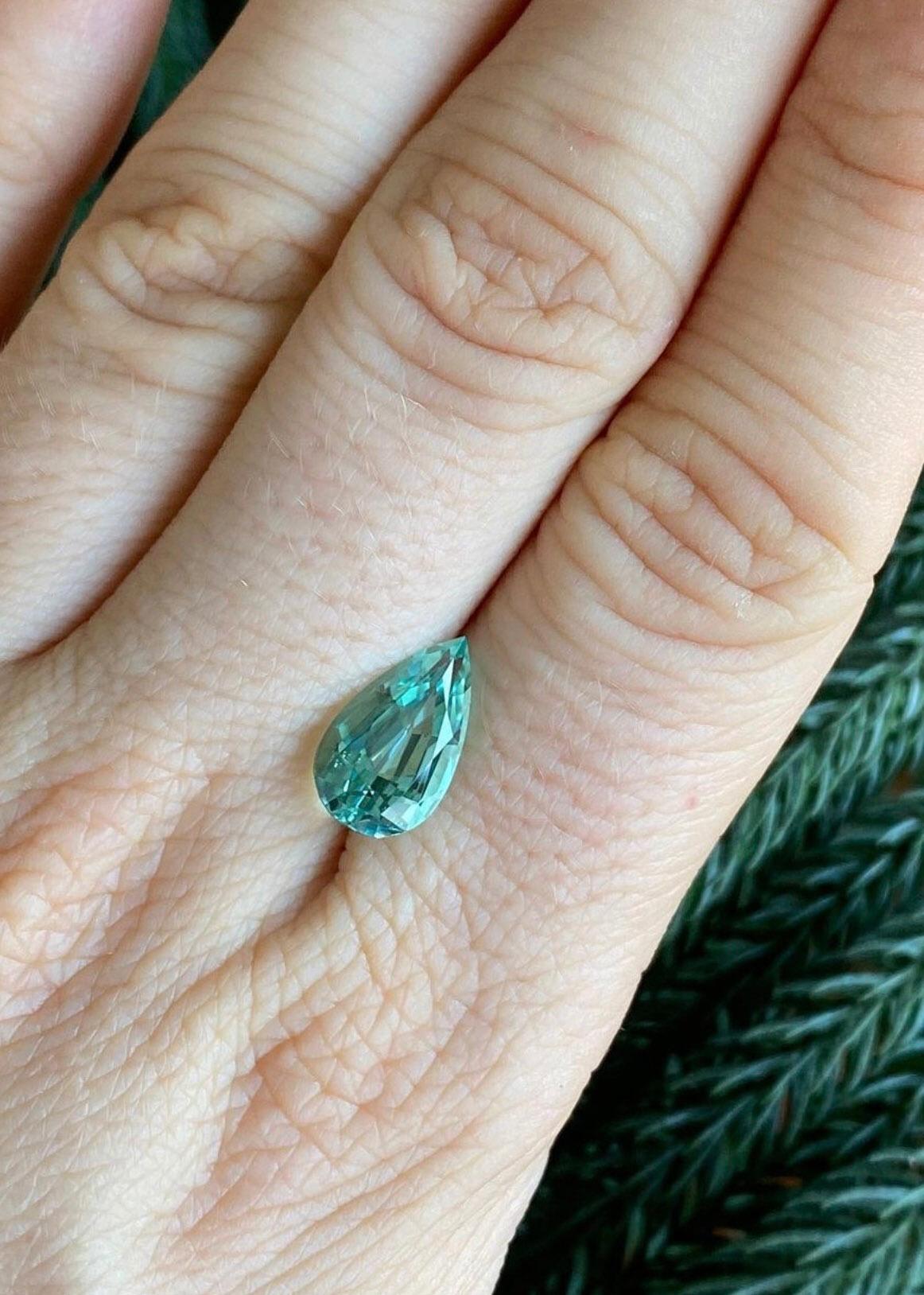 Ultra rare and exclusive 3.48 carat Paraiba Tourmaline pear shape gem offered loose to a gemstone connoisseur. 
Most Paraiba Tourmalines are significantly included. This 