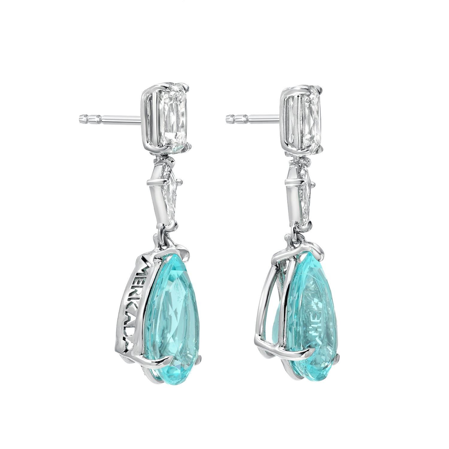 Ultra rare pair of GIA certified greenish blue Paraiba Tourmaline pear shapes, weighing a total of 6.25 carats, are set in these magnificent 1.53 carat diamond platinum earrings for women.
Paraiba Tourmalines of this color, cut and clarity are