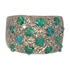 Anello a fascia con tormalina Paraiba e diamante smeraldo