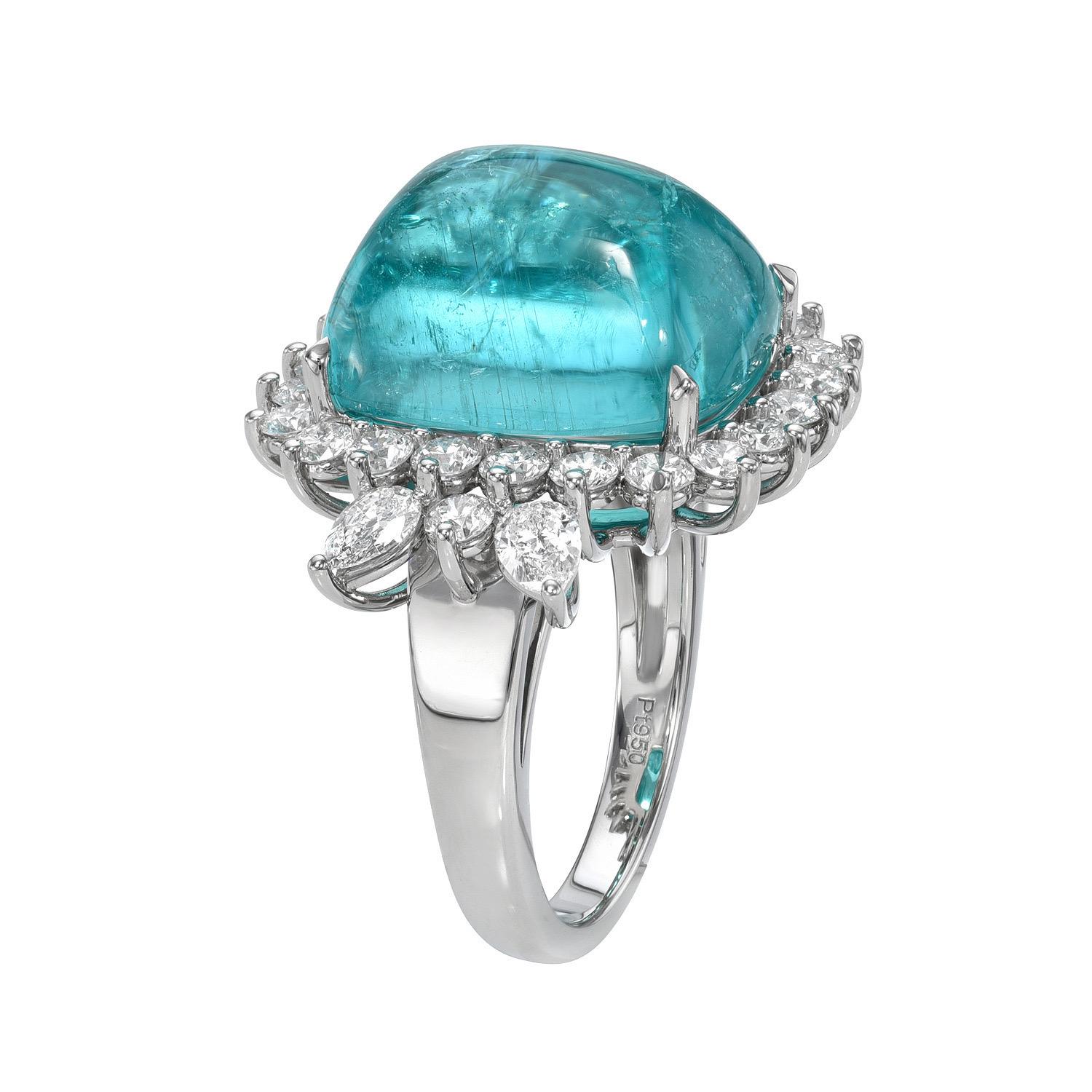 Rare and exclusive 14 carat Paraiba Tourmaline sugarloaf cabochon, decorated with E-F/VS diamonds totaling 1.60 carats, and mounted in a timeless, hand crafted, platinum ring.
Paraiba Tourmaline Dimensions: 14.89 x 12.55 x 8.25 mm.
Ring size 6.