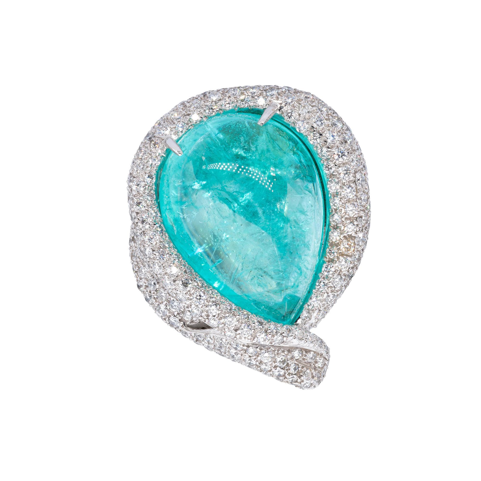 A Ring from d'Avossa Masterpiece Collection in White 18 kt gold with a central pear shape cabochon Paraiba Tourmaline of 40.02 cts enhanced by a pavé of 4.87 cts of white diamonds, G color, VVS1
A Unique Piece


Ref. Number ATP653

