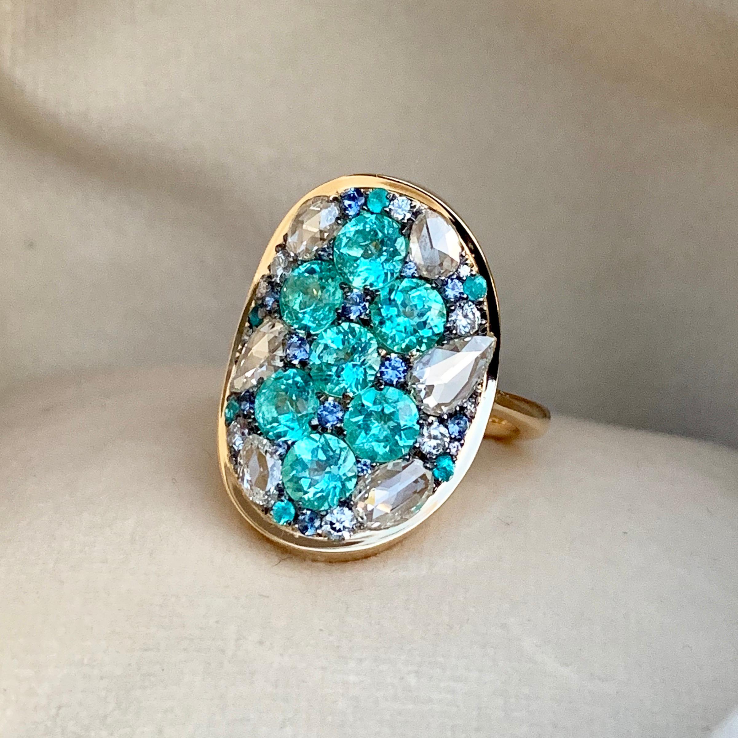 One of a kind ring handmade in Belgium from jewellery designer Joke Quick, in 18K yellow gold 9,6 g & blackened sterling silver (The stones are set on silver to create a black background for the stones). Pave set with paraiba tourmalines 2,84 ct. ,